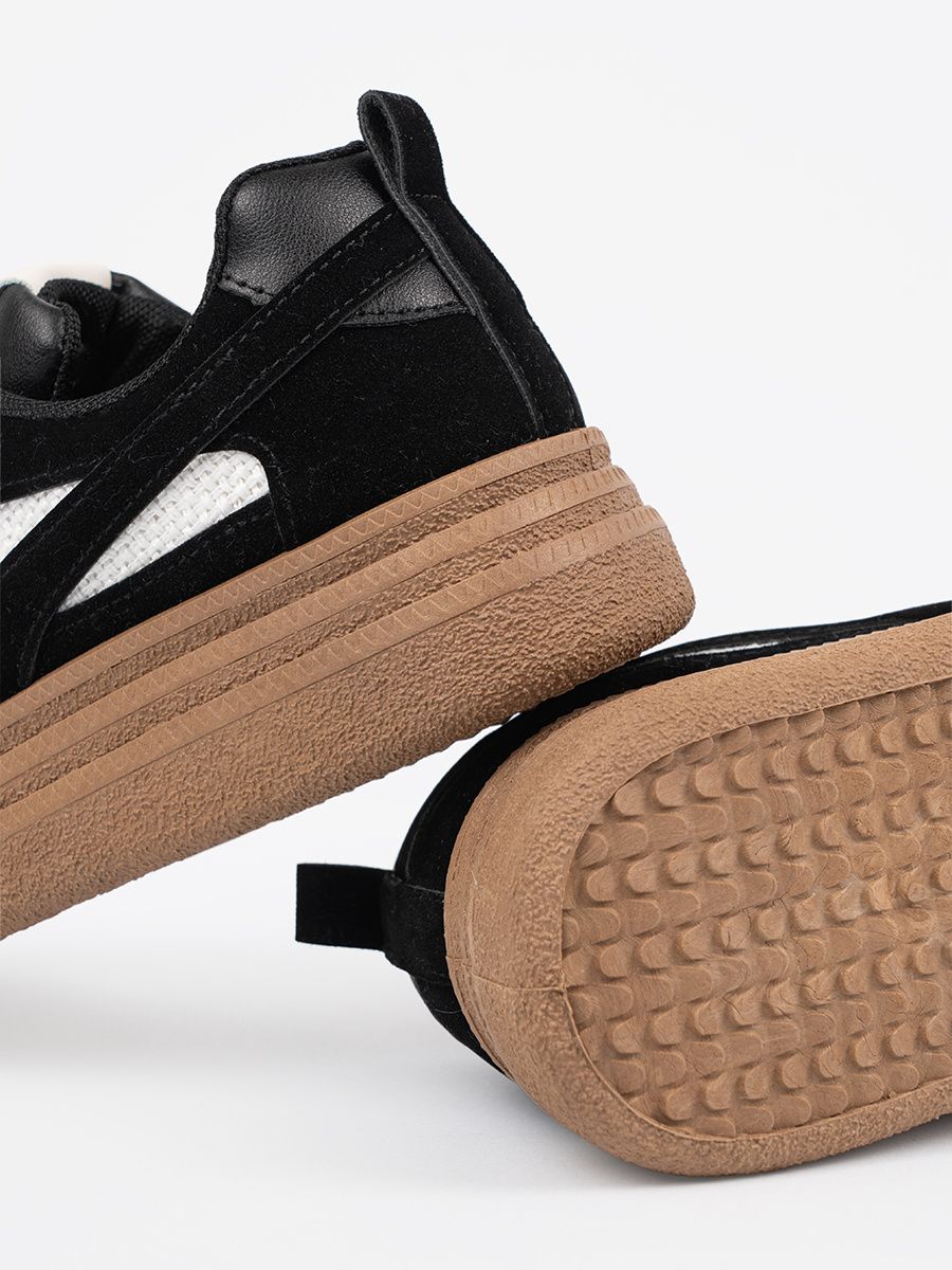 Black Sneakers with White Accents