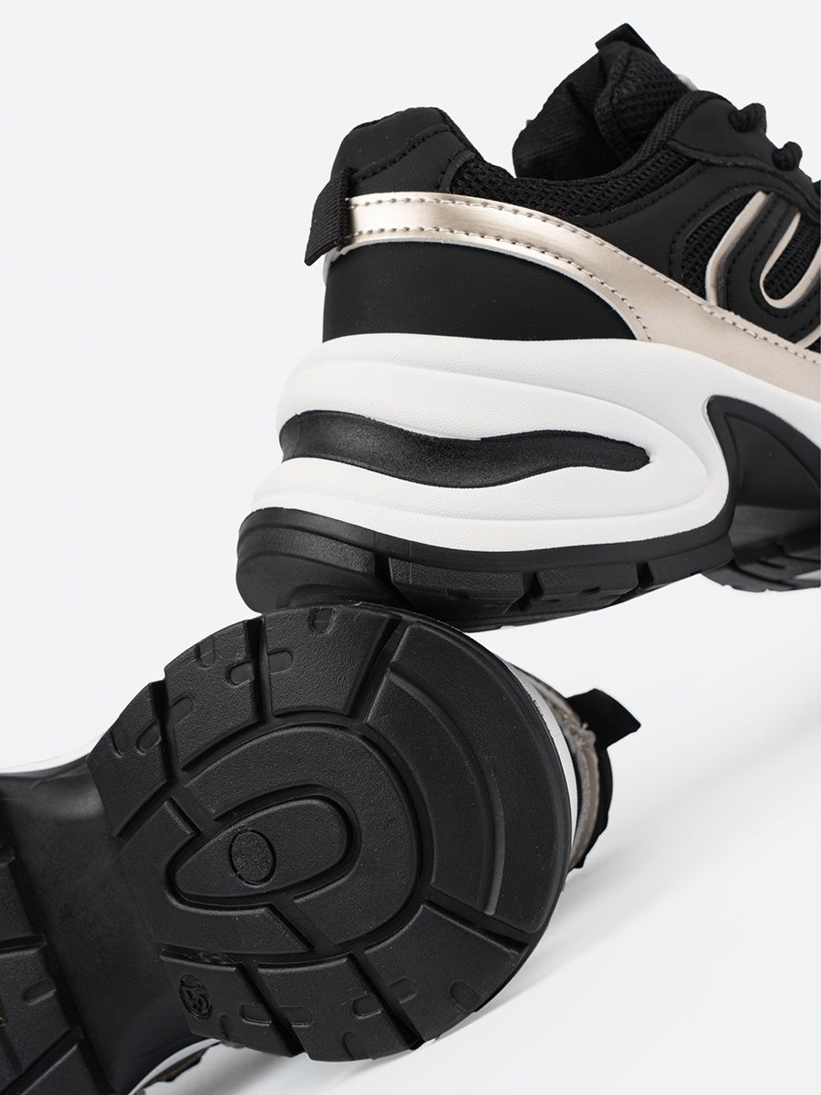 Black Sneakers with Gold Accents