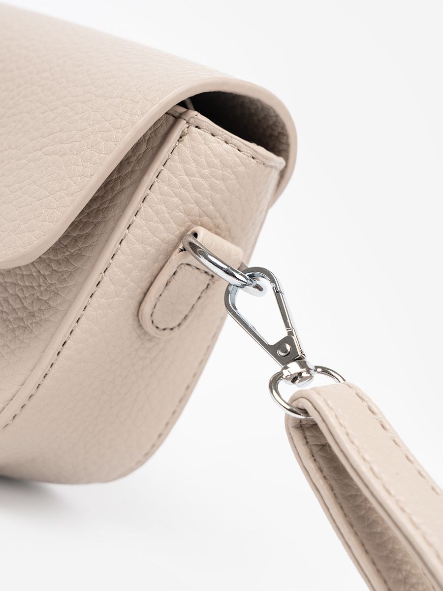 Elegant Beige Crossbody Bag with Decorative Heart