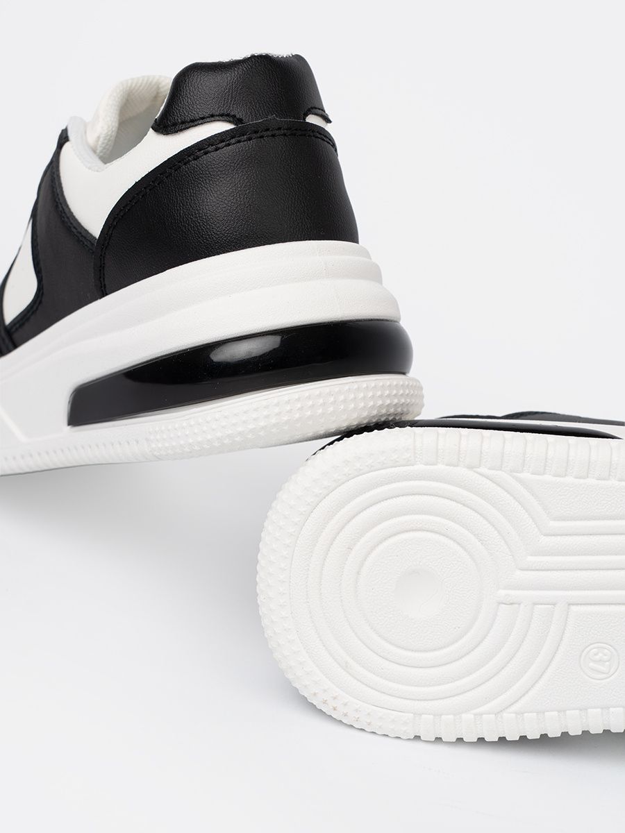 Stylish Black and White Sneakers with Thick Sole