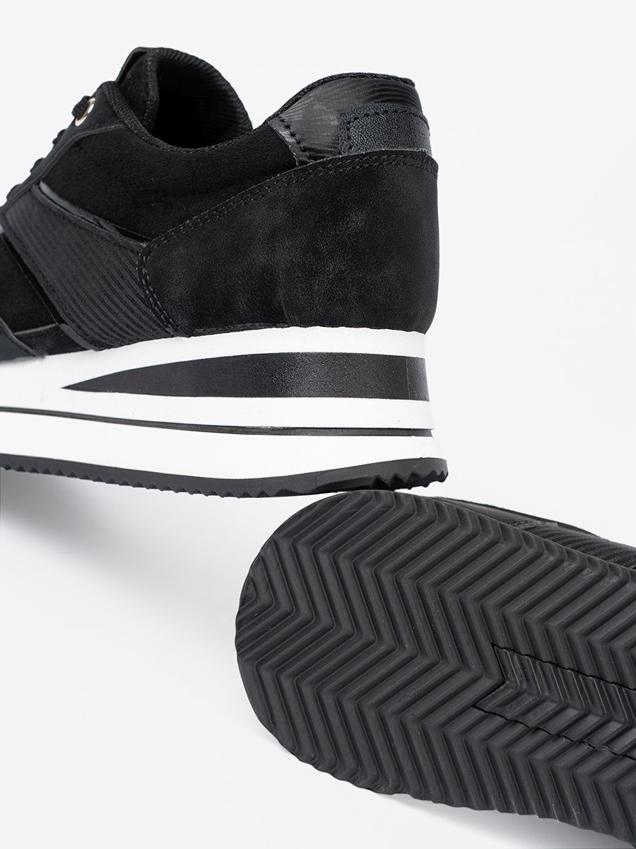 Modern Black Sneakers with Shiny Details