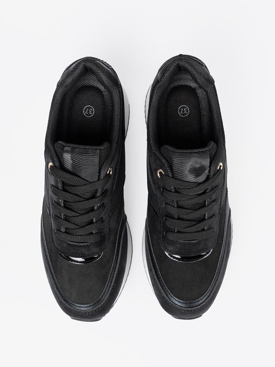 Modern Black Sneakers with Shiny Details