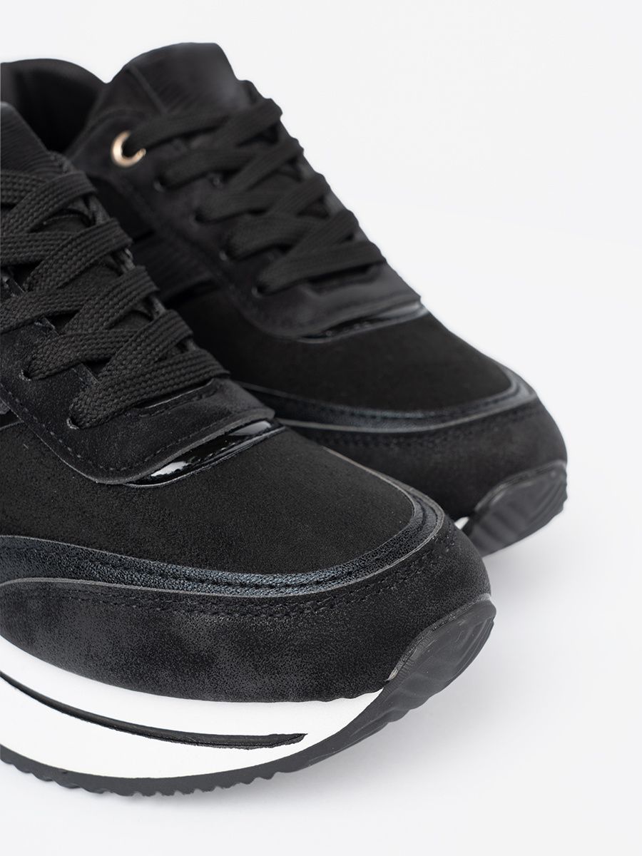 Modern Black Sneakers with Shiny Details