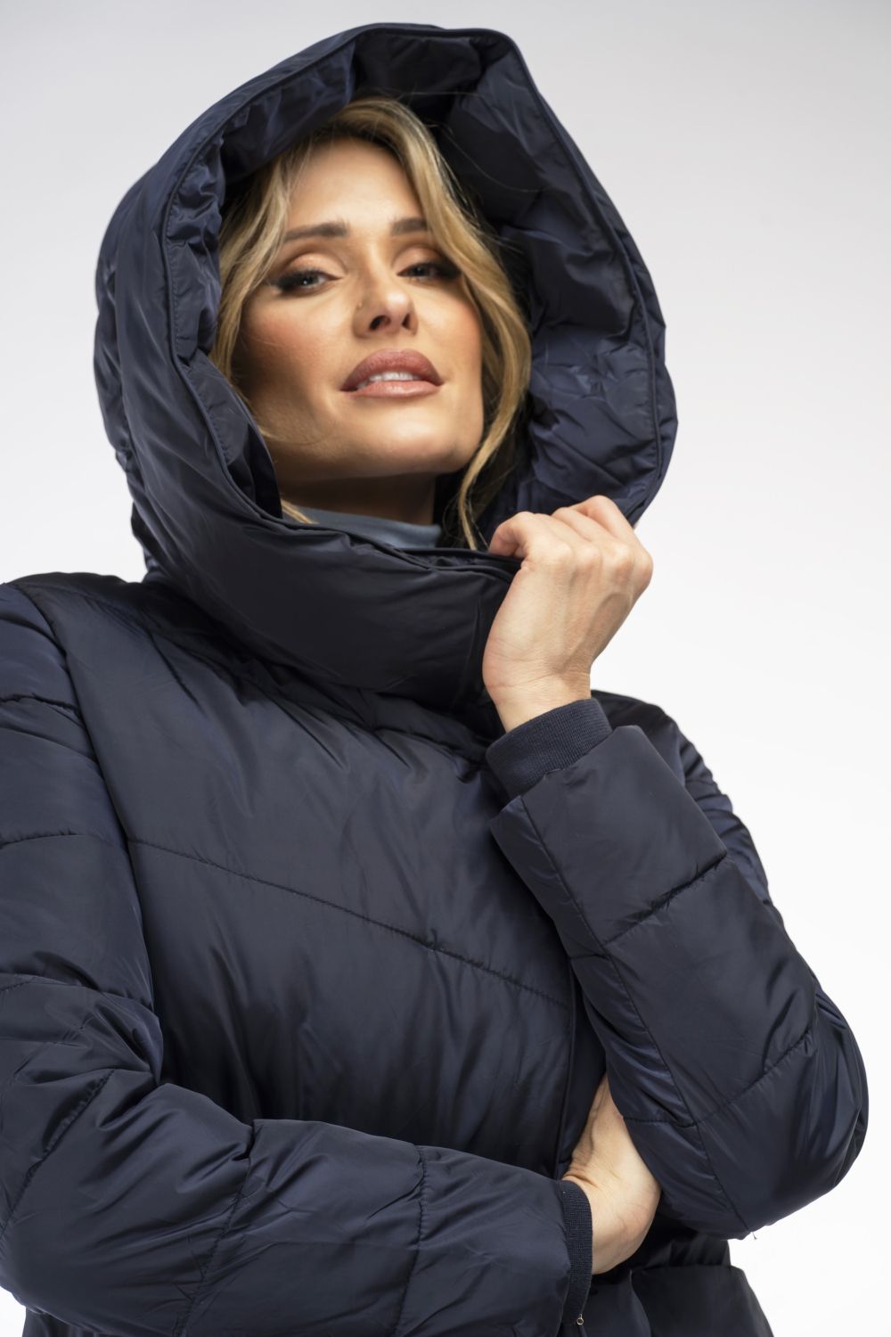 Dark blue winter jacket with a high collar