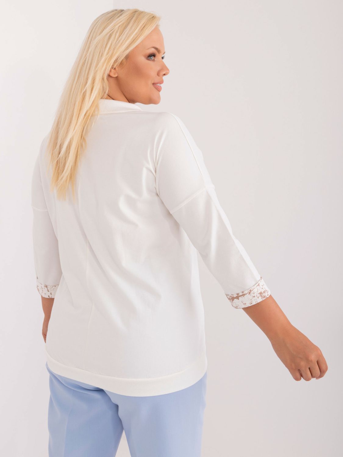 Elegant ecru blouse with ties