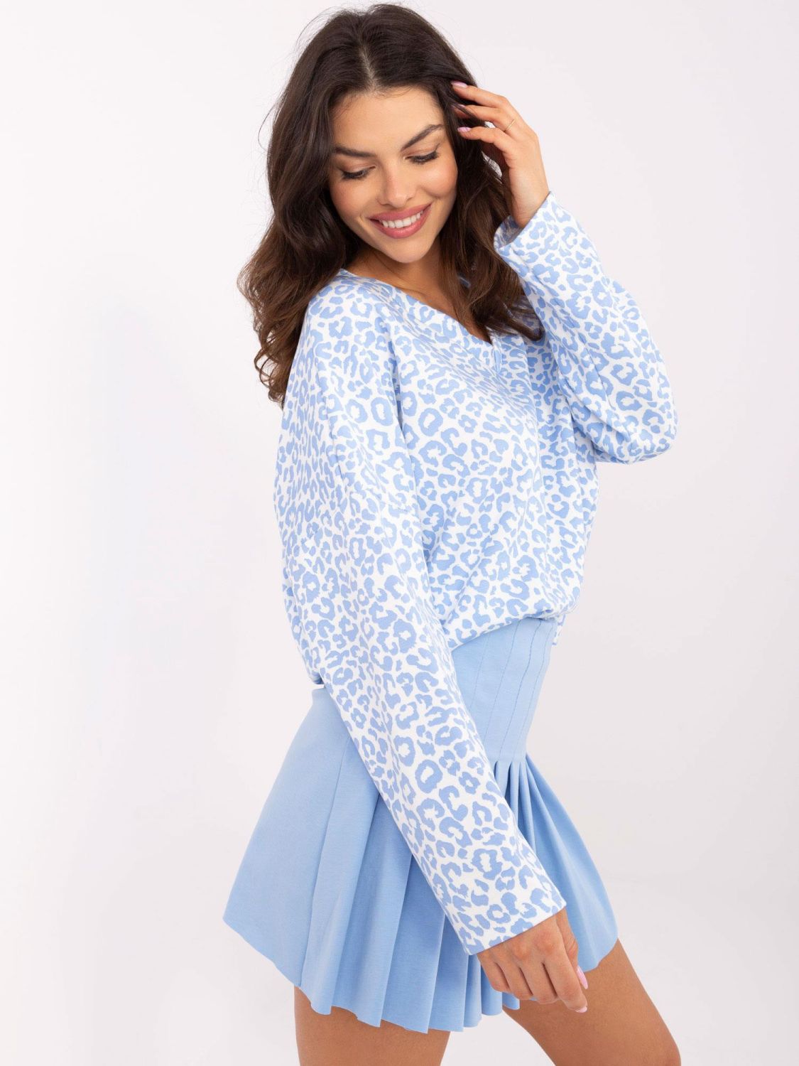 Stylish White Blouse with Blue Animal Print