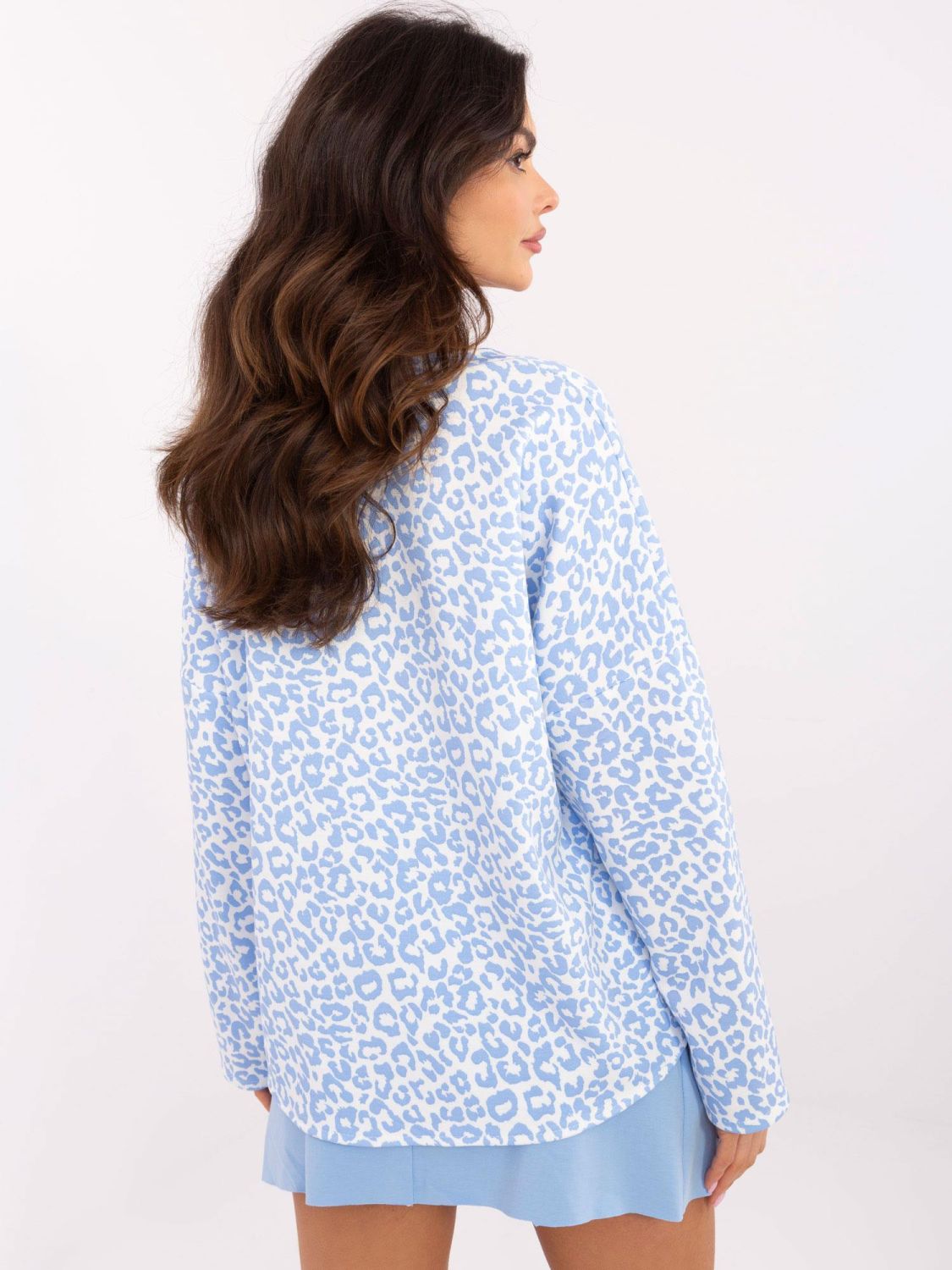 Stylish White Blouse with Blue Animal Print
