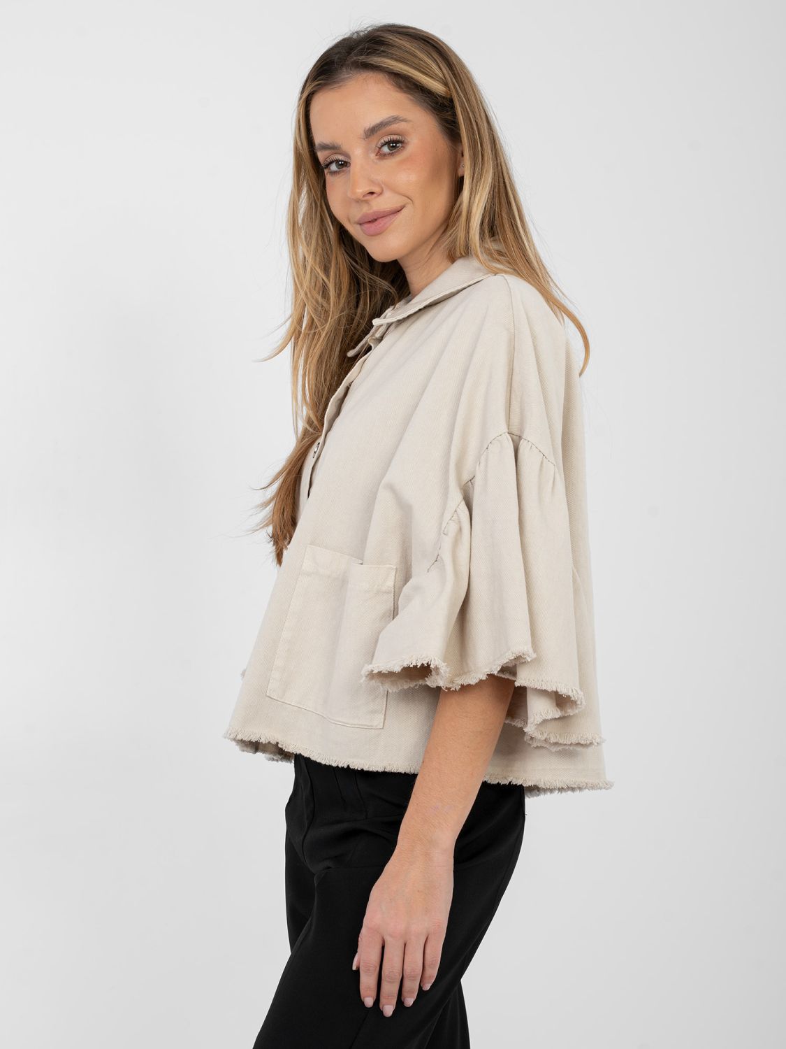 Beige short denim jacket with ruffle