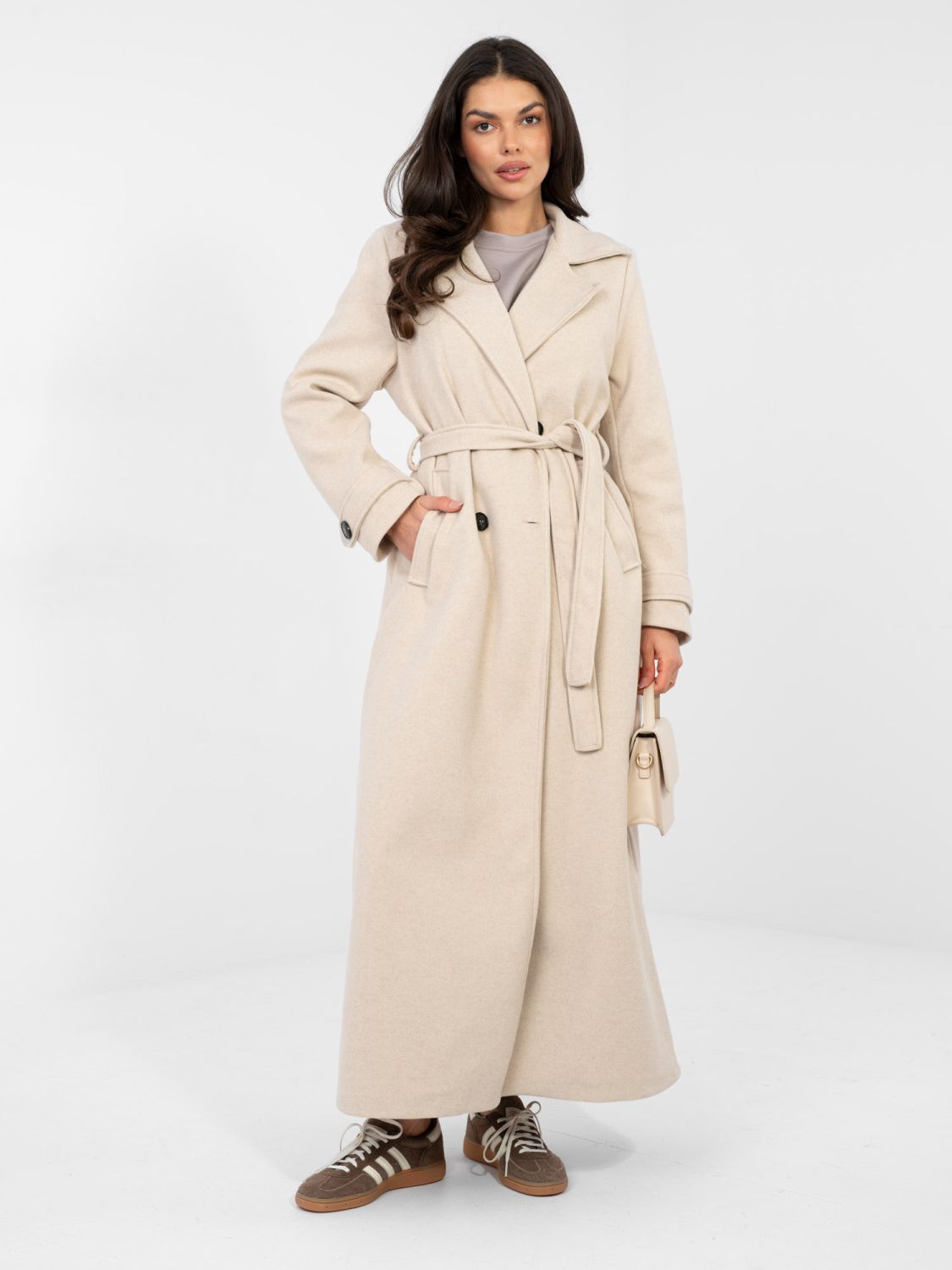 Elegant beige transitional coat with belt