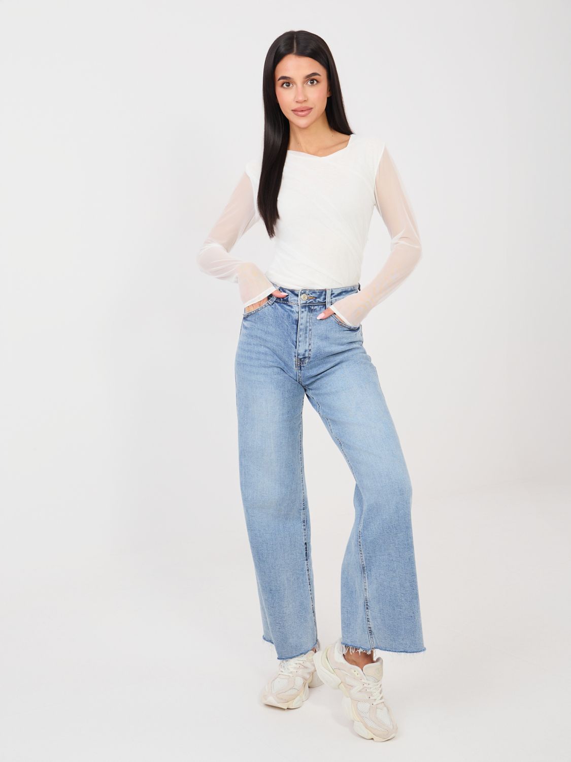 Elegant white bodysuit with long sleeves and round neckline