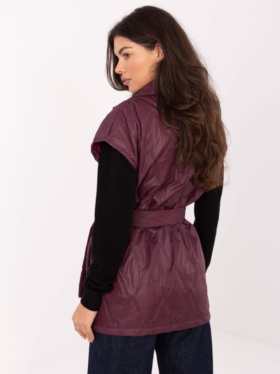Elegant quilted burgundy vest with belt