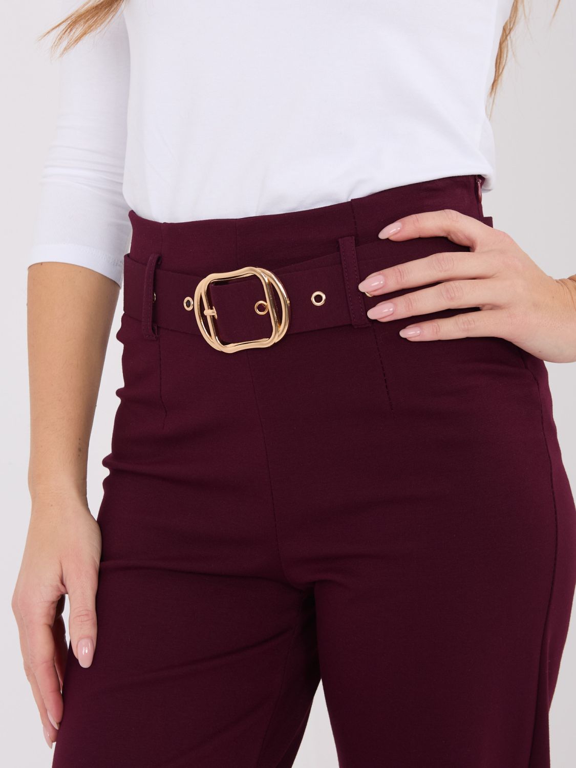 Elegant burgundy high-waisted trousers with belt