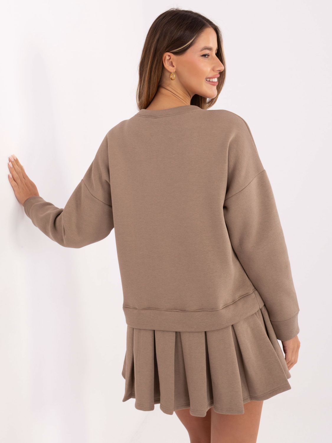 Beige flared mini dress with long sleeves
