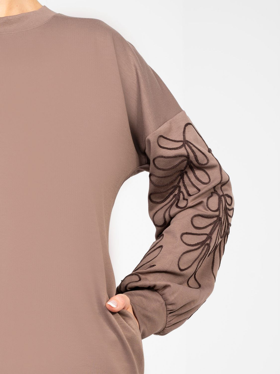 Beige mini dress with embroidery and puff sleeves