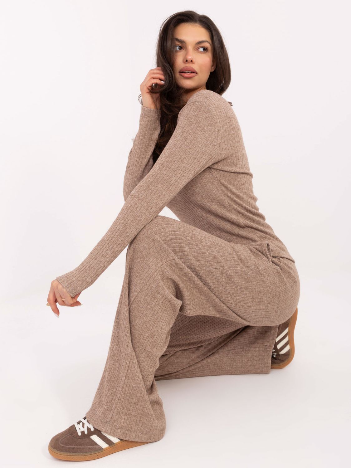 Beige wide ribbed knit trousers with high waist