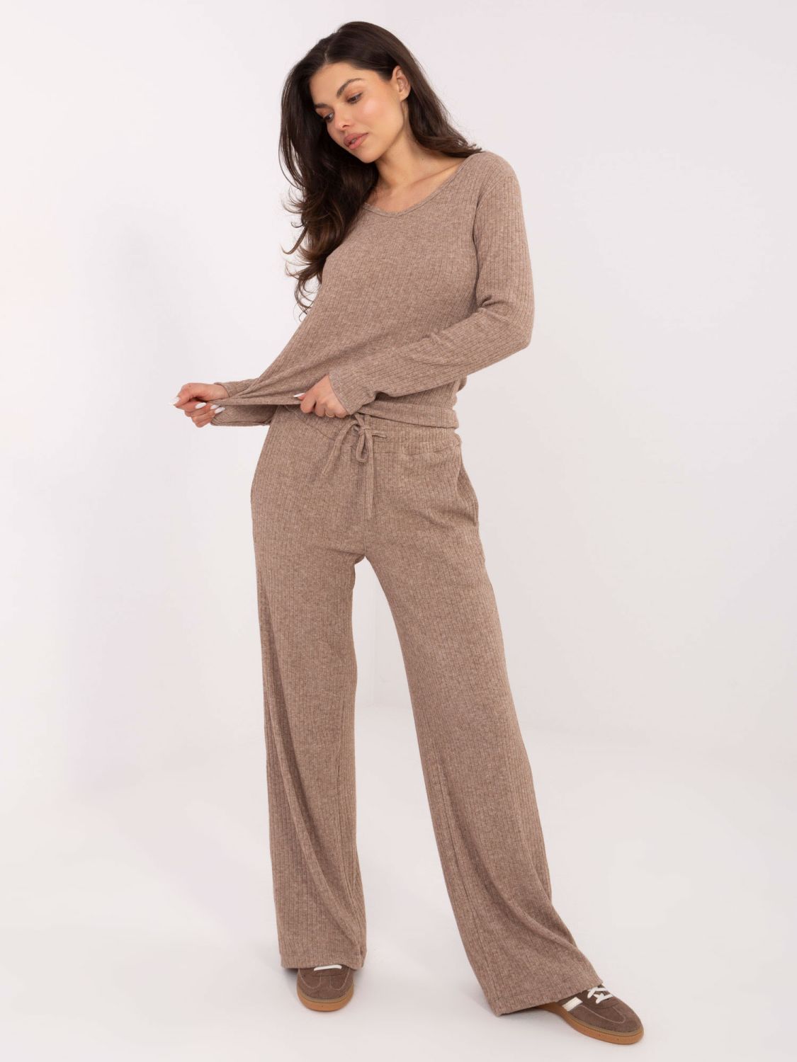 Beige wide ribbed knit trousers with high waist