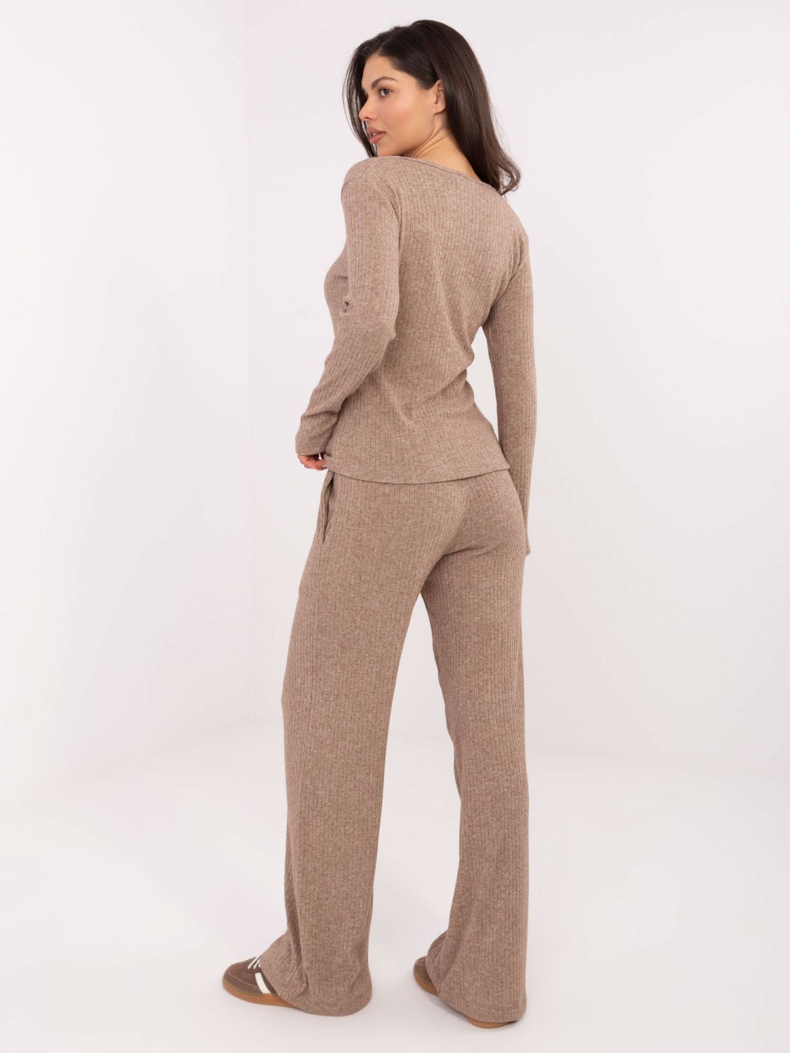 Beige wide ribbed knit trousers with high waist