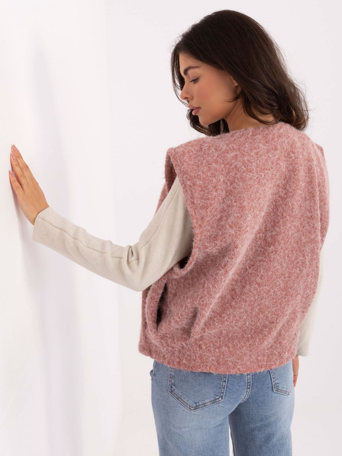 Stylish dark pink knitted vest with pockets