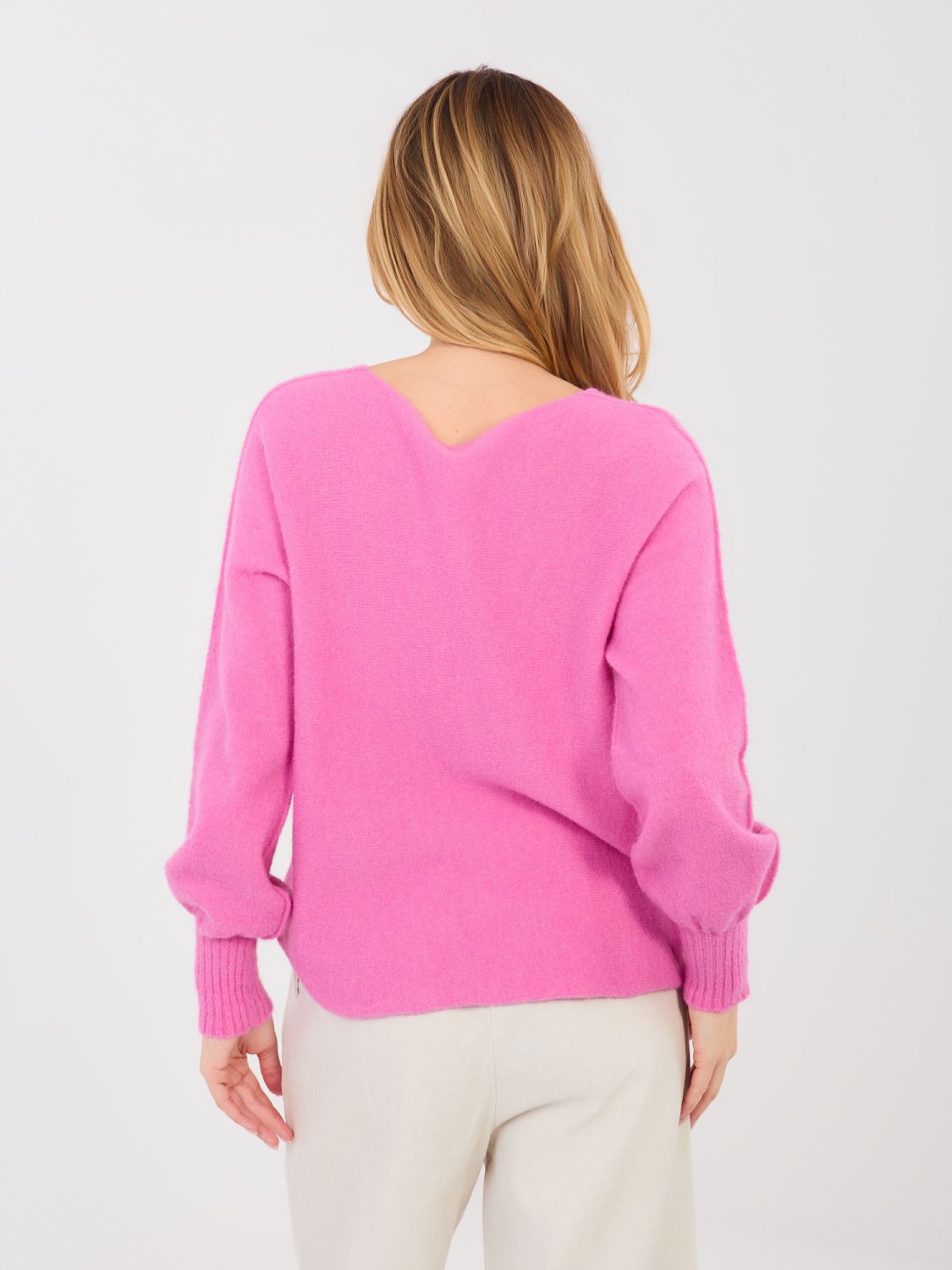 Pink sweater with V-neck and balloon sleeves