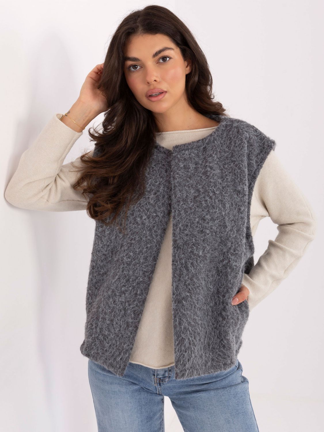 Modern grey knitted vest with pockets
