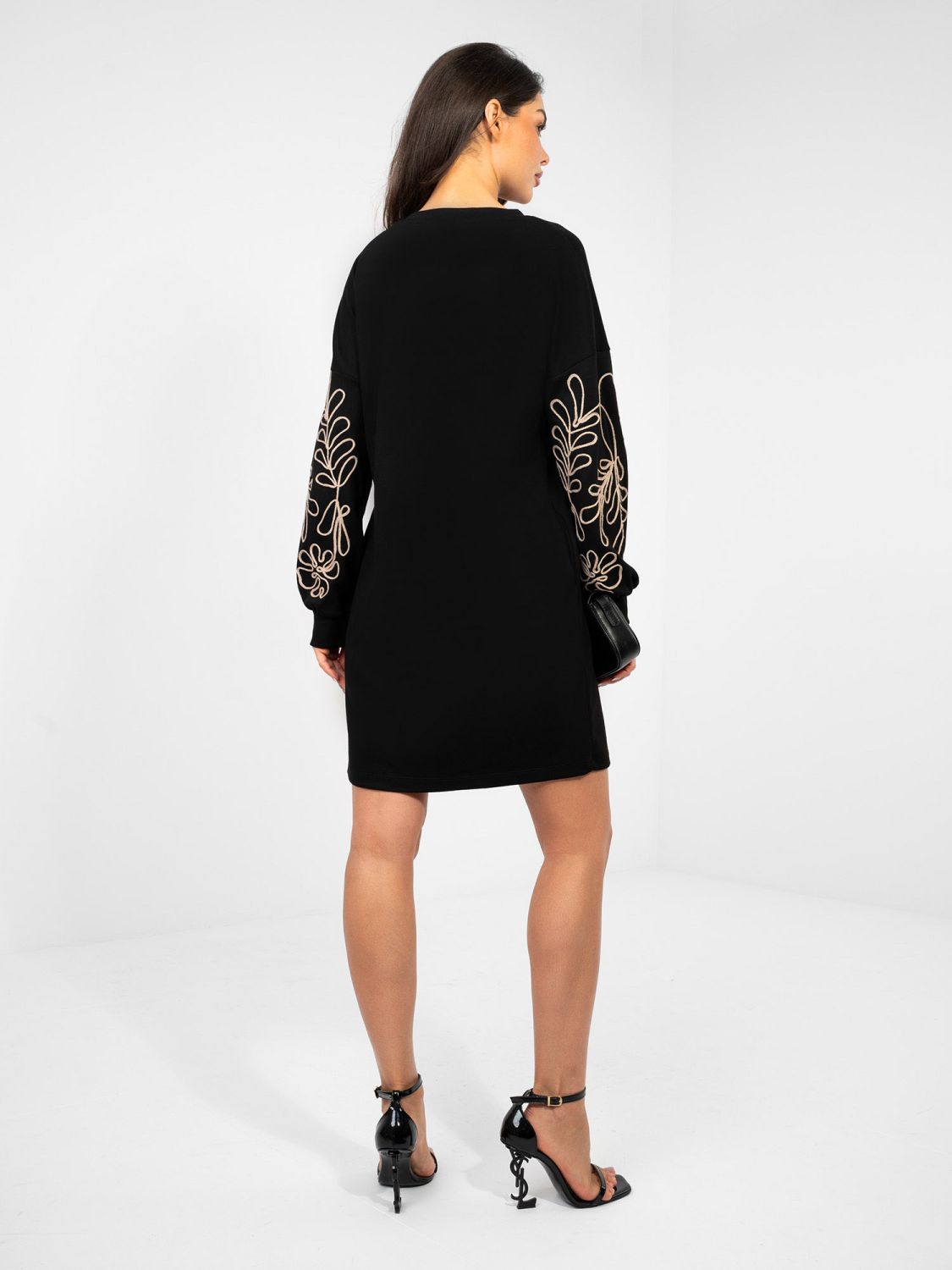 Black mini dress with embroidery and puff sleeves