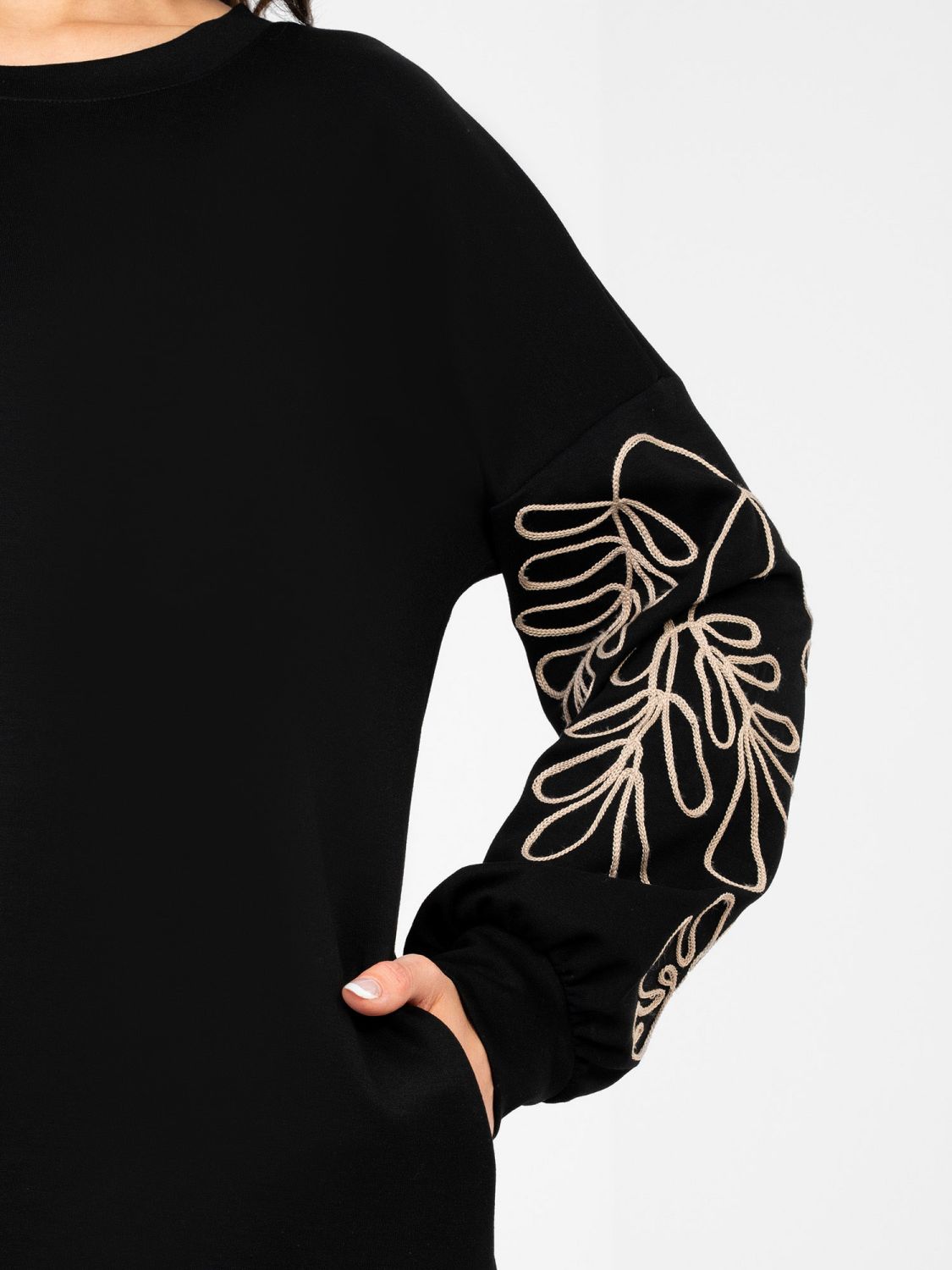 Black mini dress with embroidery and puff sleeves