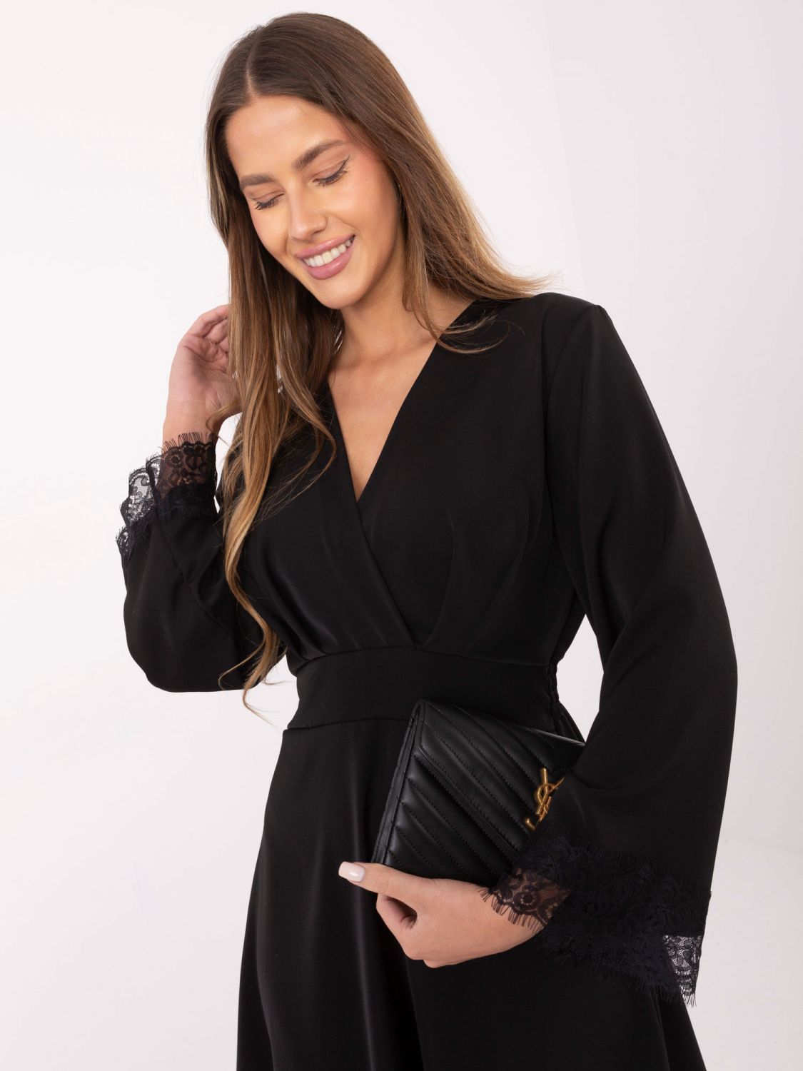Elegant black midi dress with lace and wrap neckline