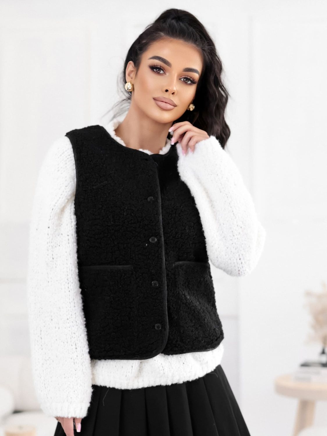 Black faux fur women's vest with buttons
