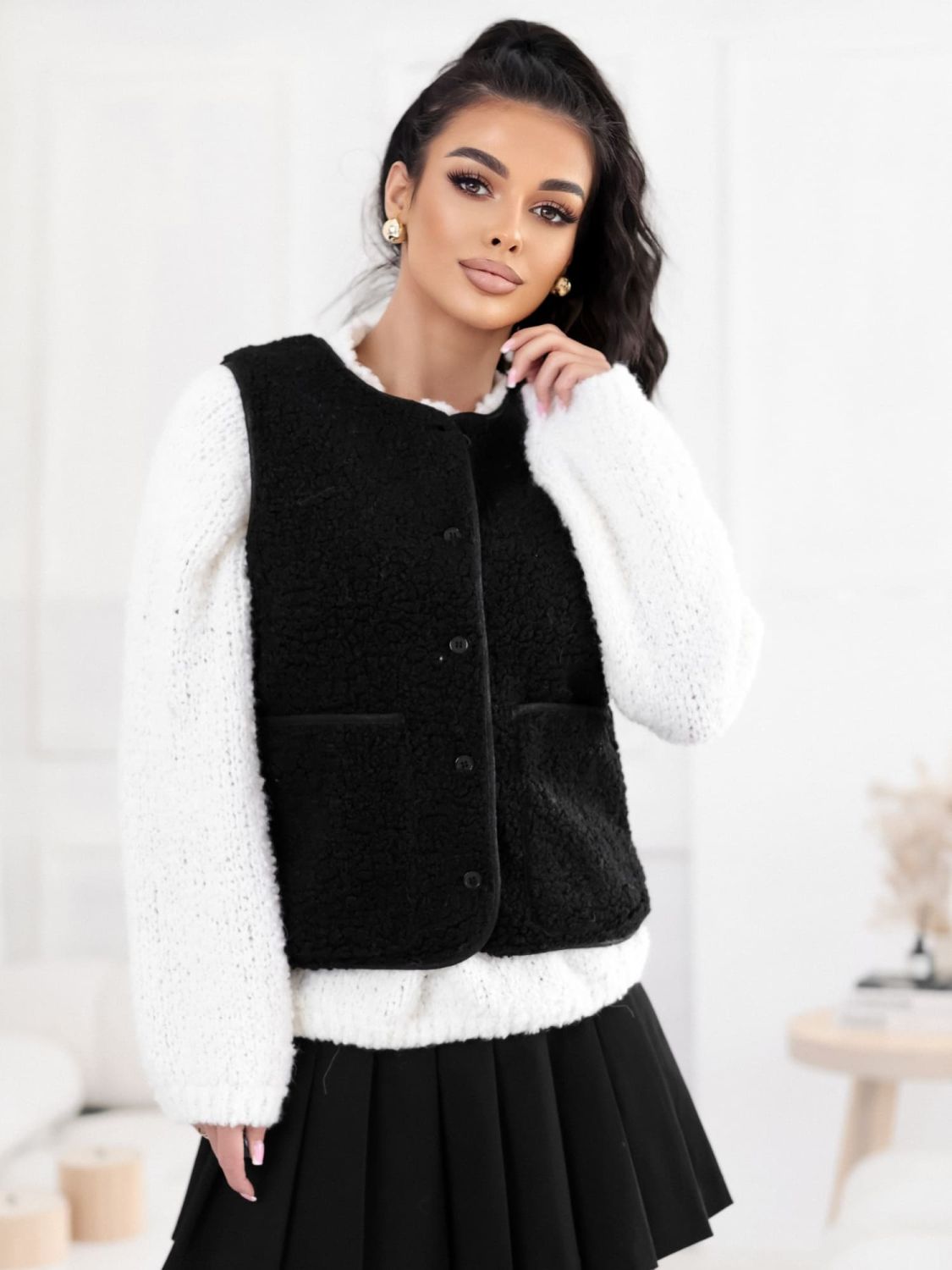 Black faux fur women's vest with buttons