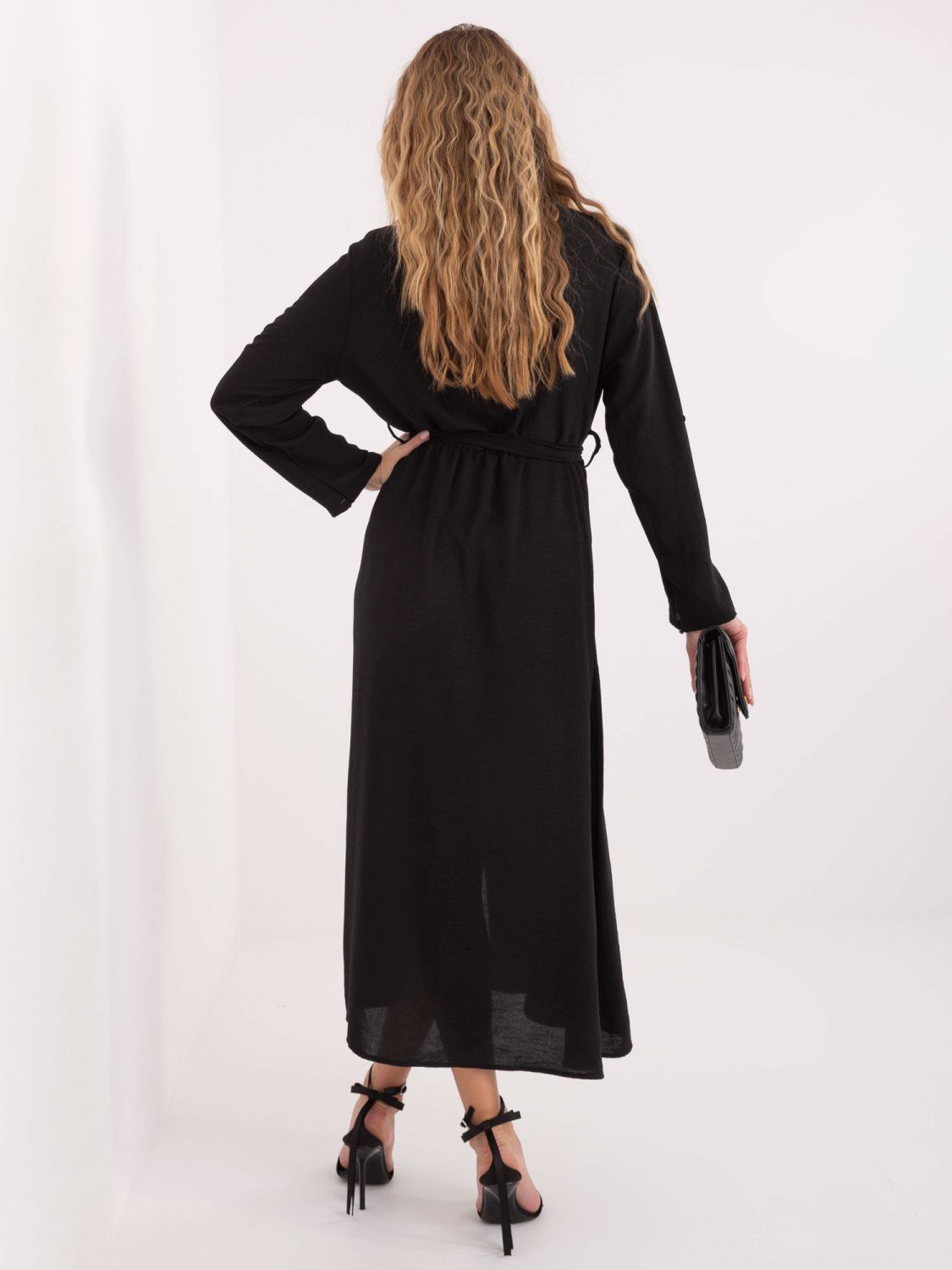 Black flared midi dress with belt and brooch