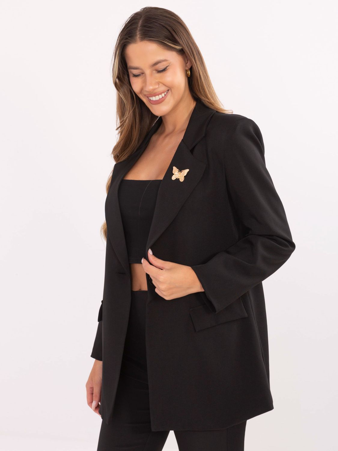 Elegant black blazer with lining and brooch