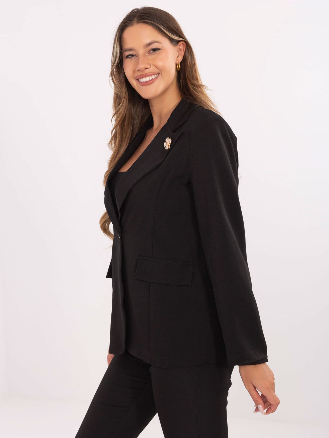 Elegant black blazer with brooch and lining
