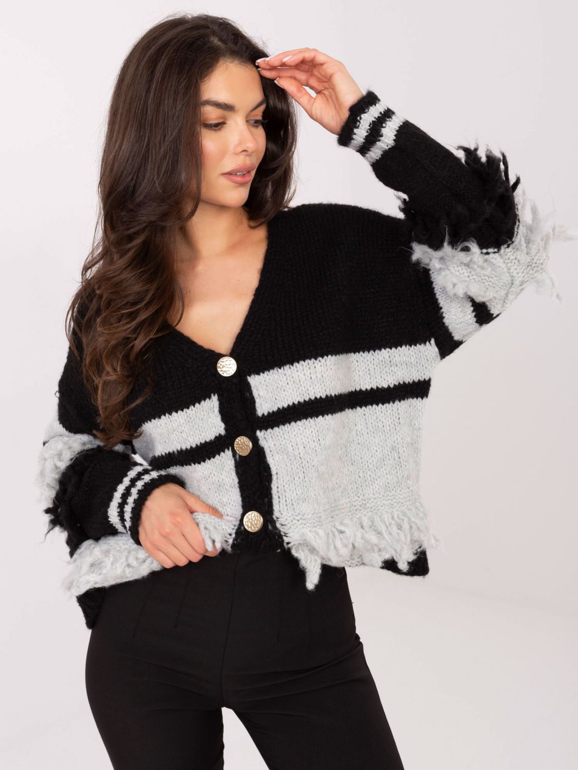 Black striped sweater with V-neck and fringes