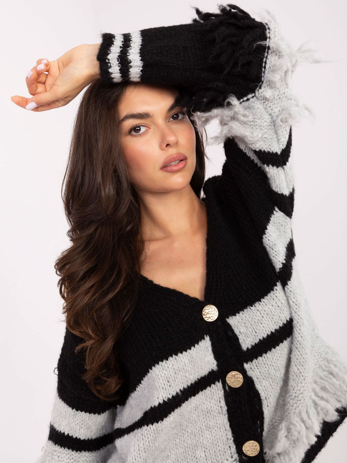 Black striped sweater with V-neck and fringes