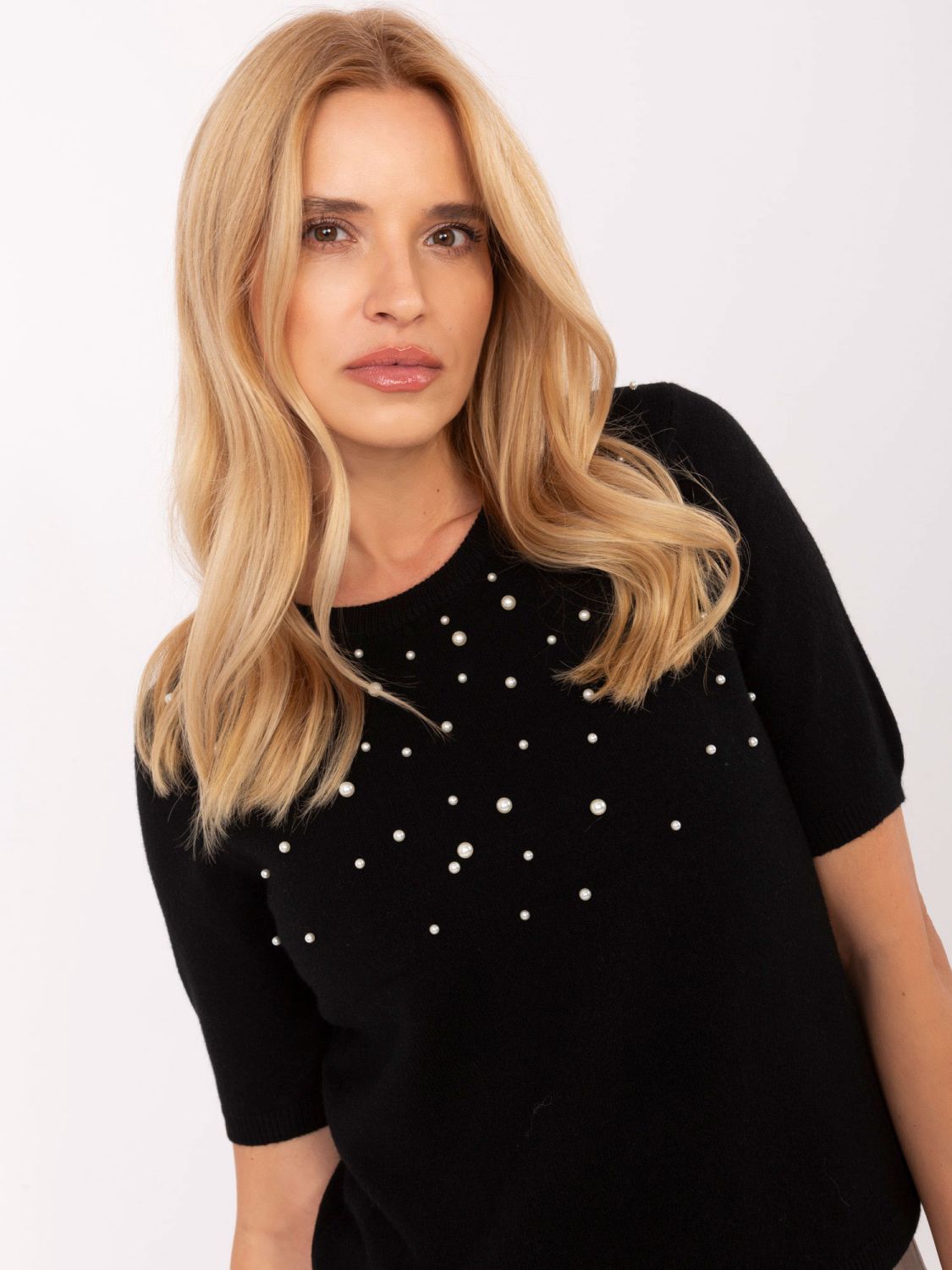 Elegant black sweater with application