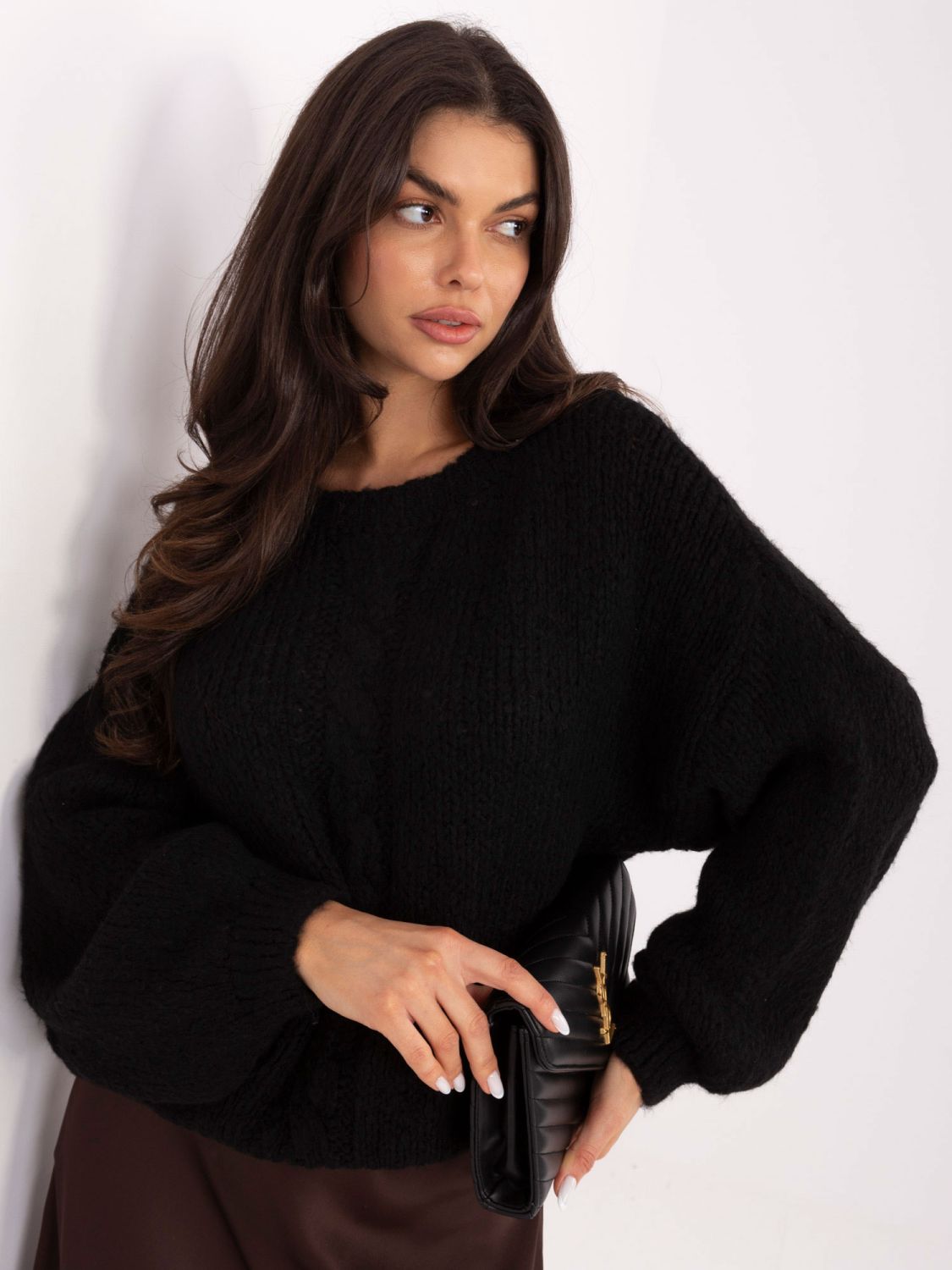 Black sweater with puff sleeves and round neckline