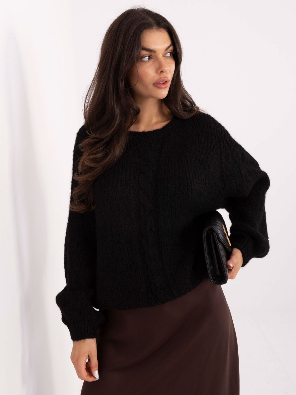 Black sweater with puff sleeves and round neckline