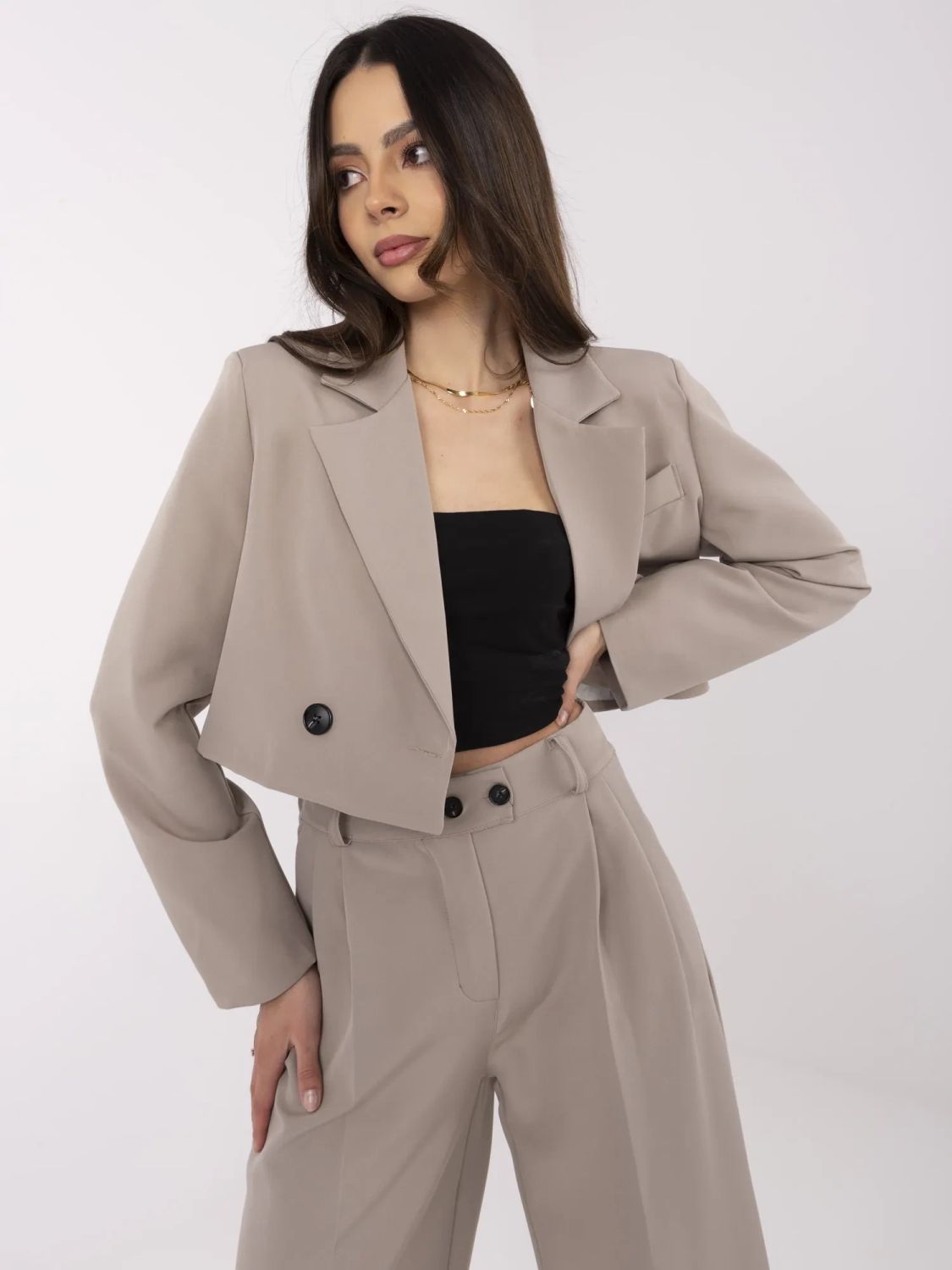 Beige women's set with long-sleeve blazer and wide-leg trousers