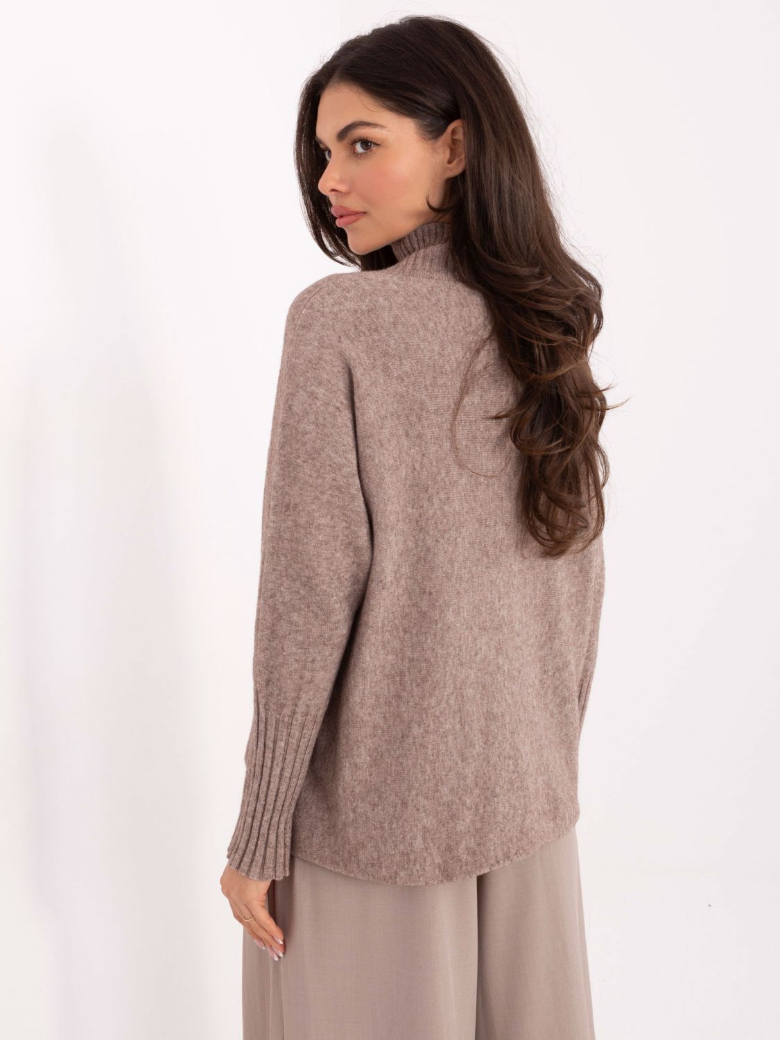 Beige turtleneck sweater with smooth pattern