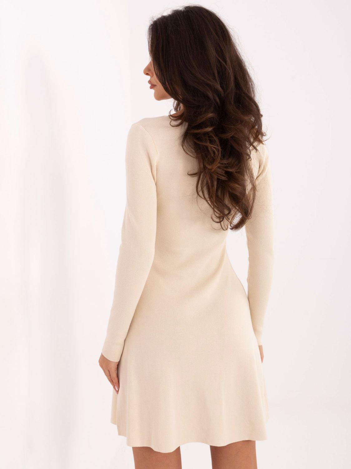 Elegant light beige ribbed knit mini dress with V-neckline