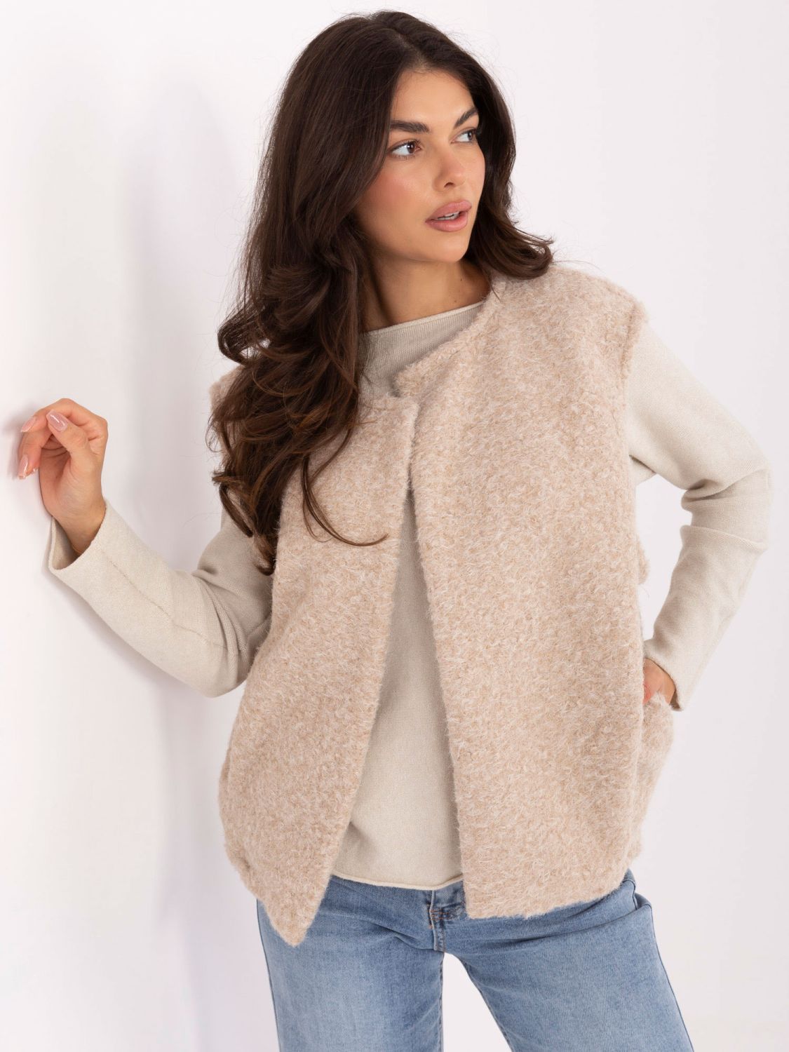 Beige knitted vest with pockets