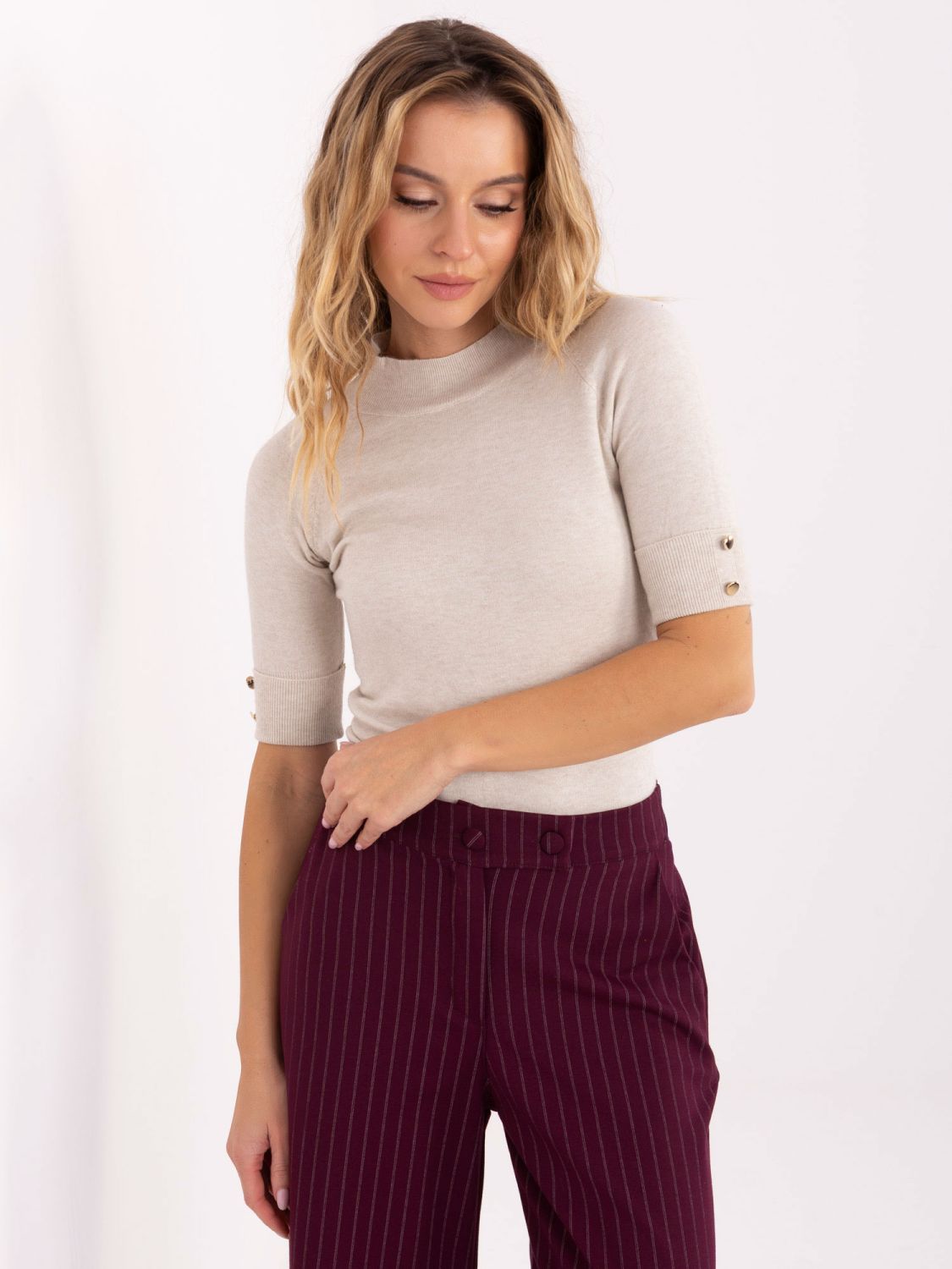 Elegant beige sweater with mock neck and short sleeves