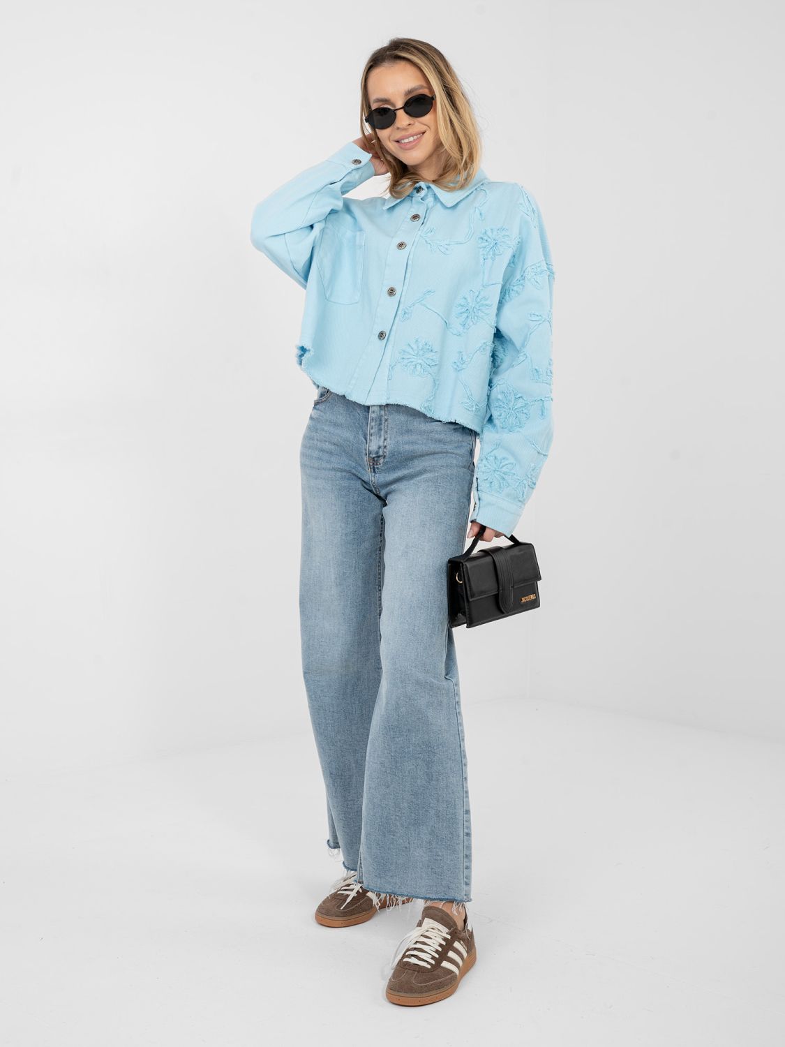 Short light blue denim jacket with floral appliqué