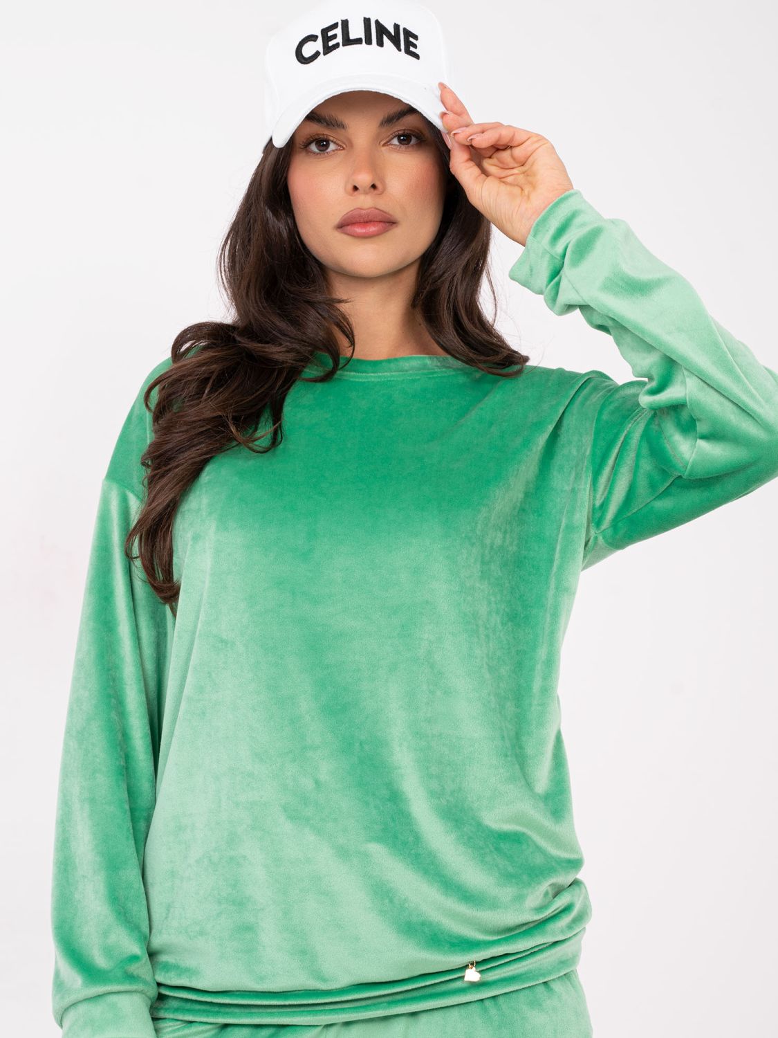 Women's green set with long sleeves and decorative details
