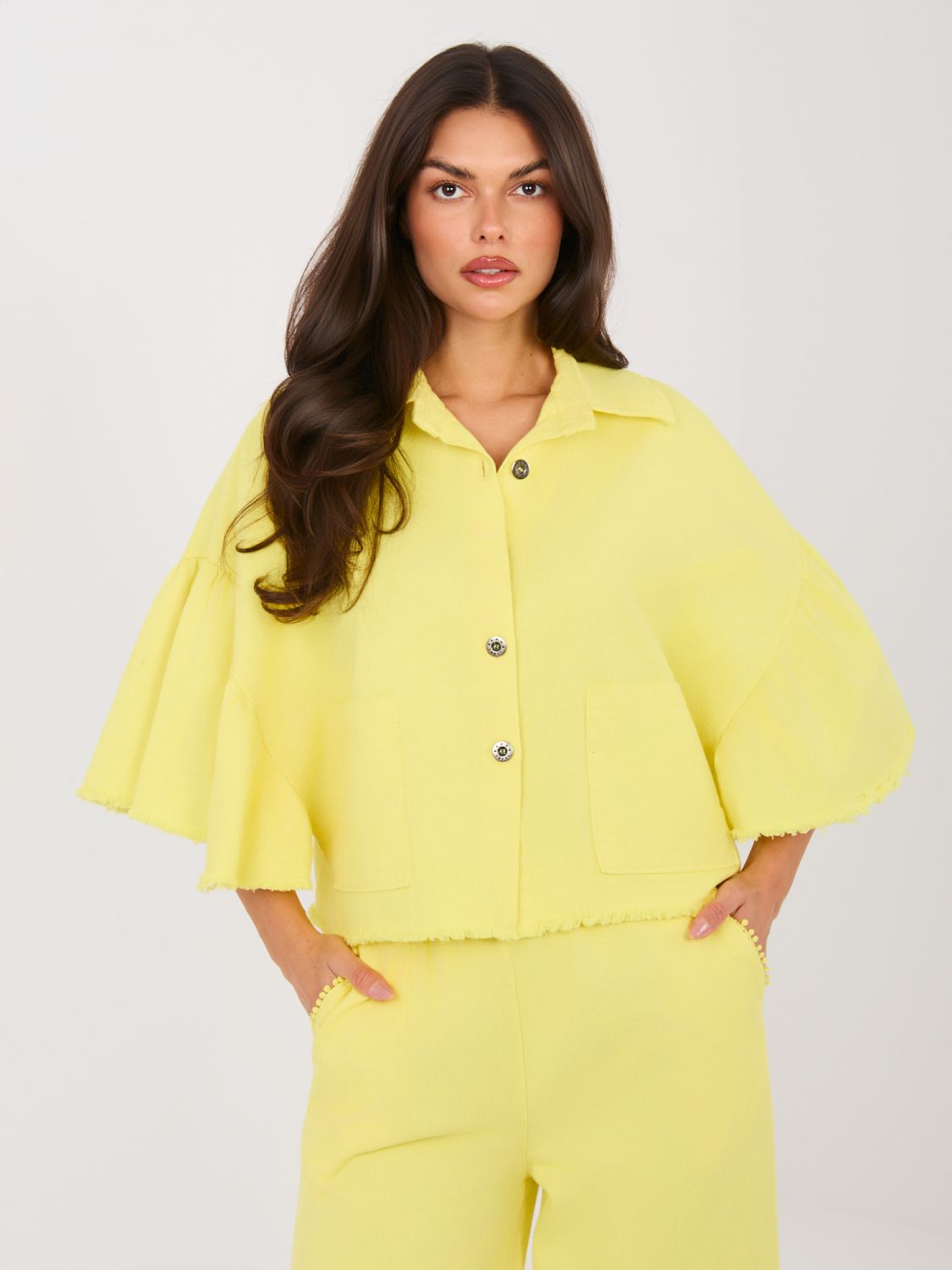 Short yellow denim jacket with ruffle and 3/4 sleeves