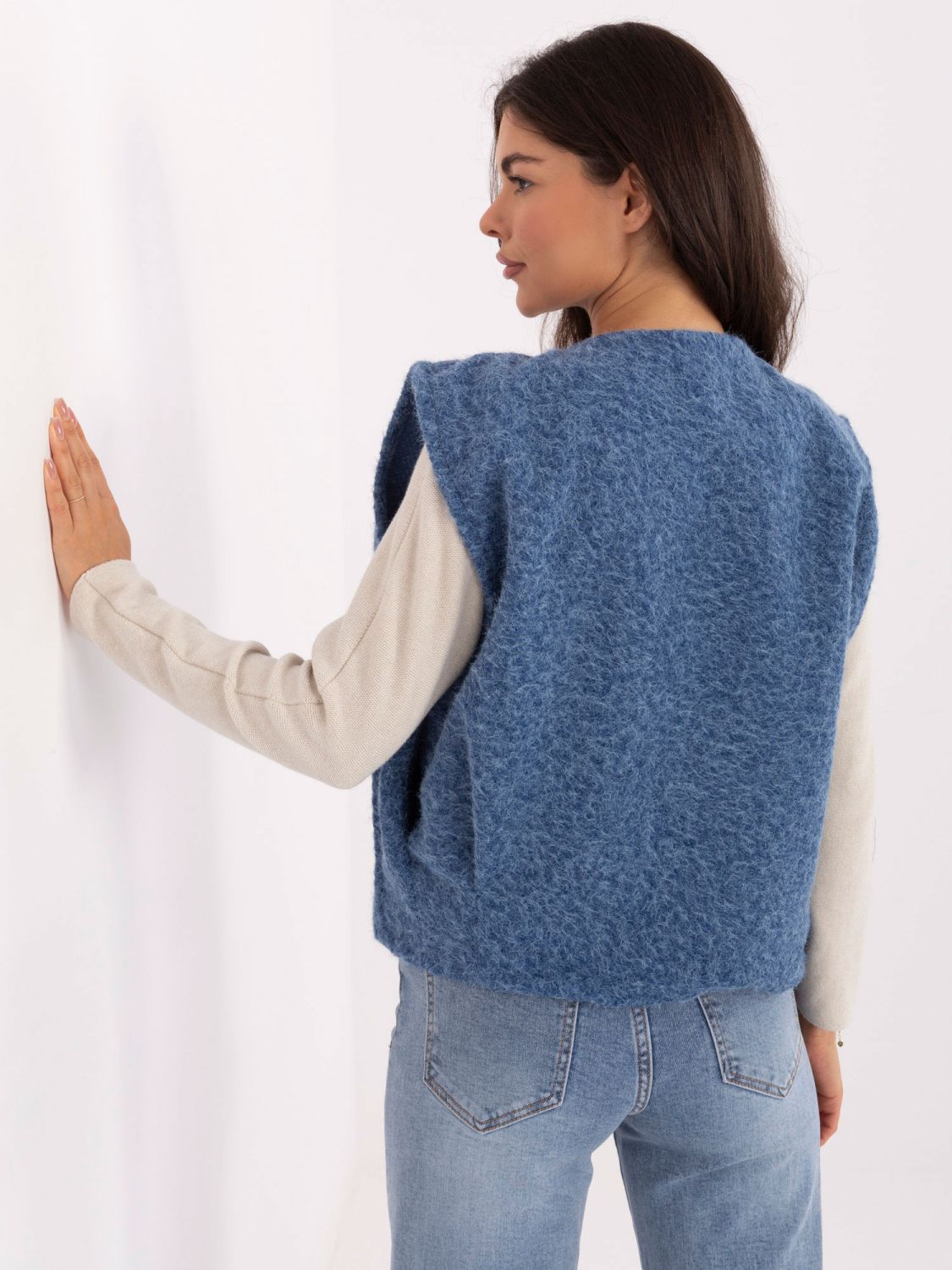 Blue knitted vest with pockets