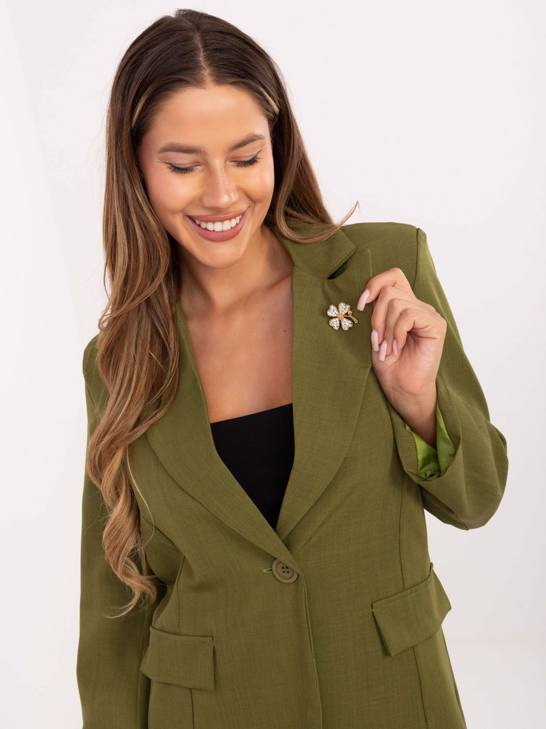 Elegant olive green blazer with brooch
