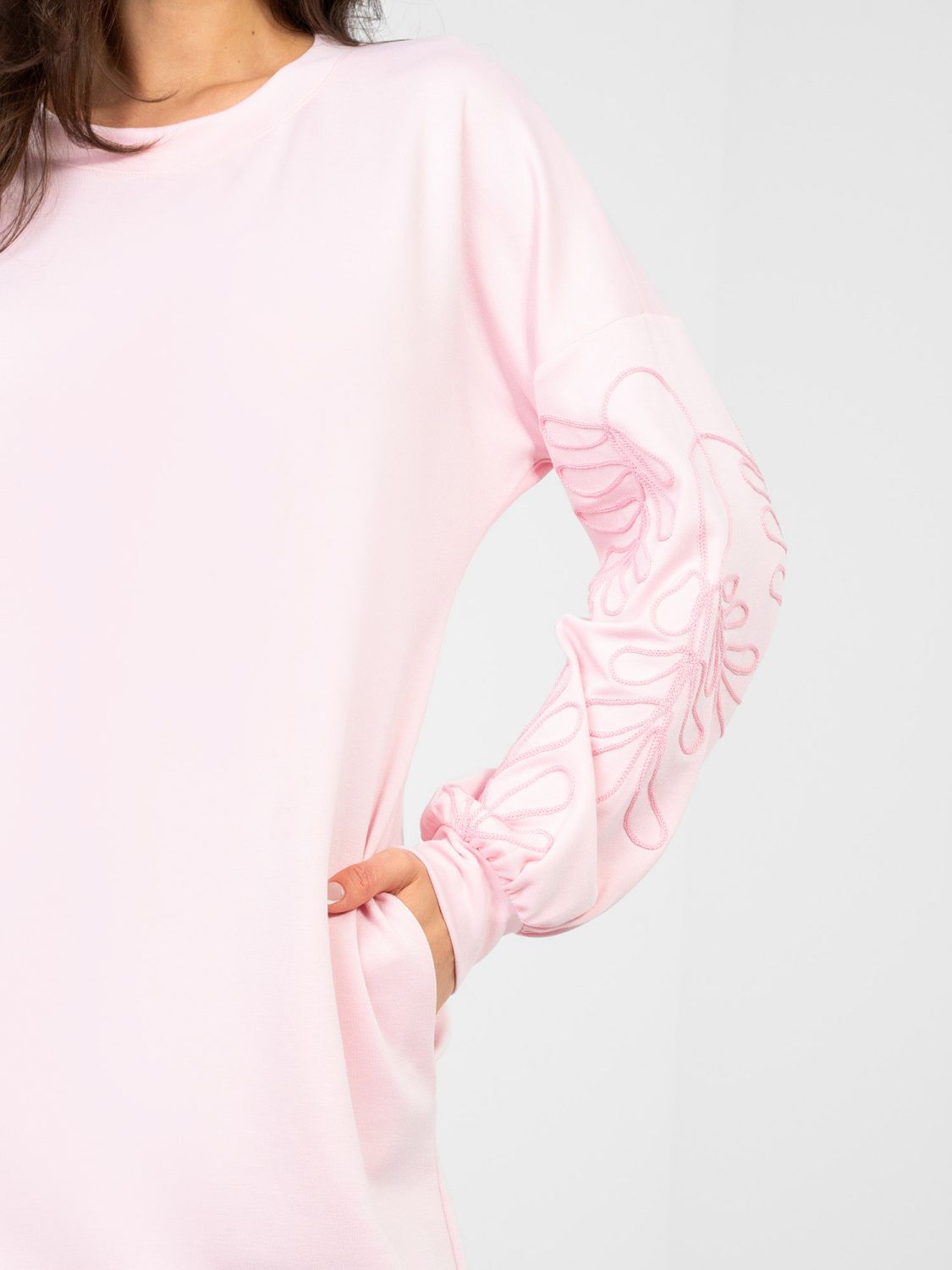 Pink mini dress with embroidery and puff sleeves