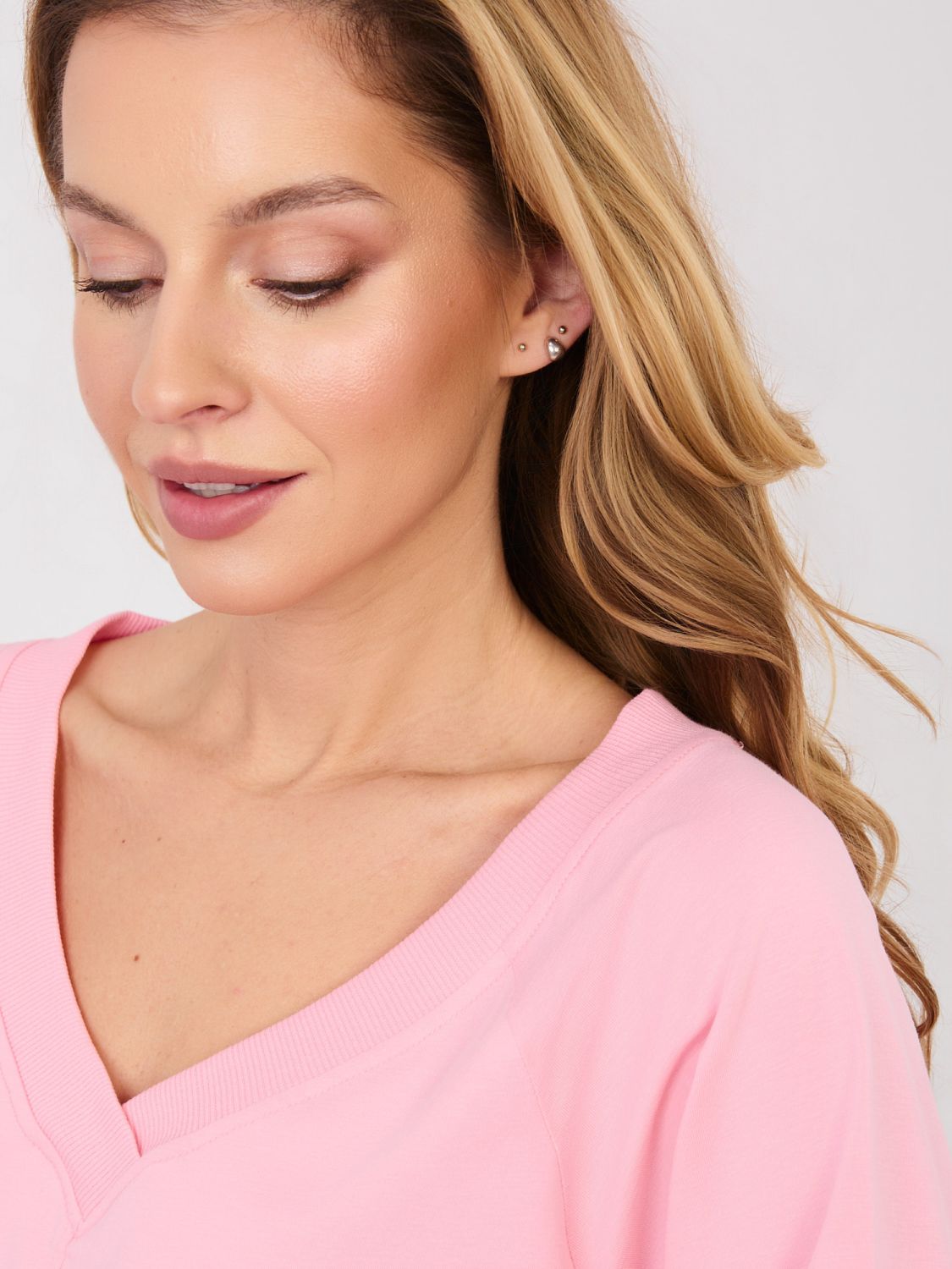 Pink cotton dress with 3/4 sleeves and V-neckline