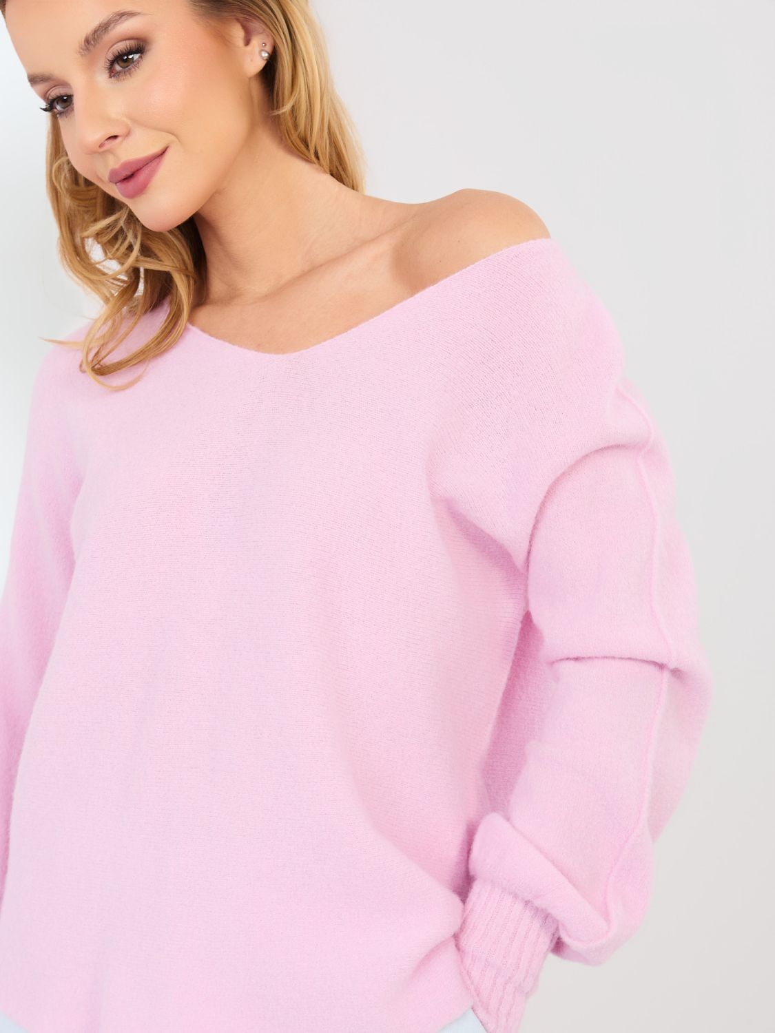 Pink V-neck knitted sweater
